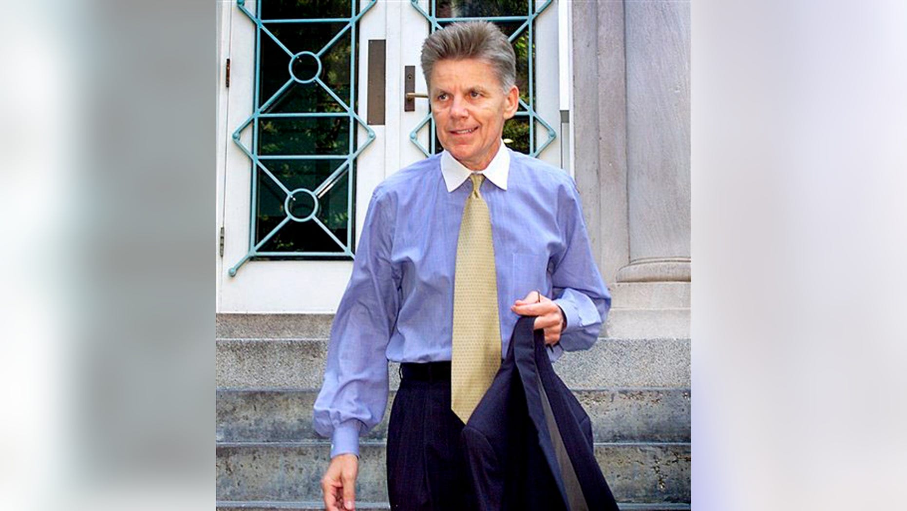 July 11, 2001: Then-Rep. Gary Condit, D-Calif., leaves his Washington apartment.