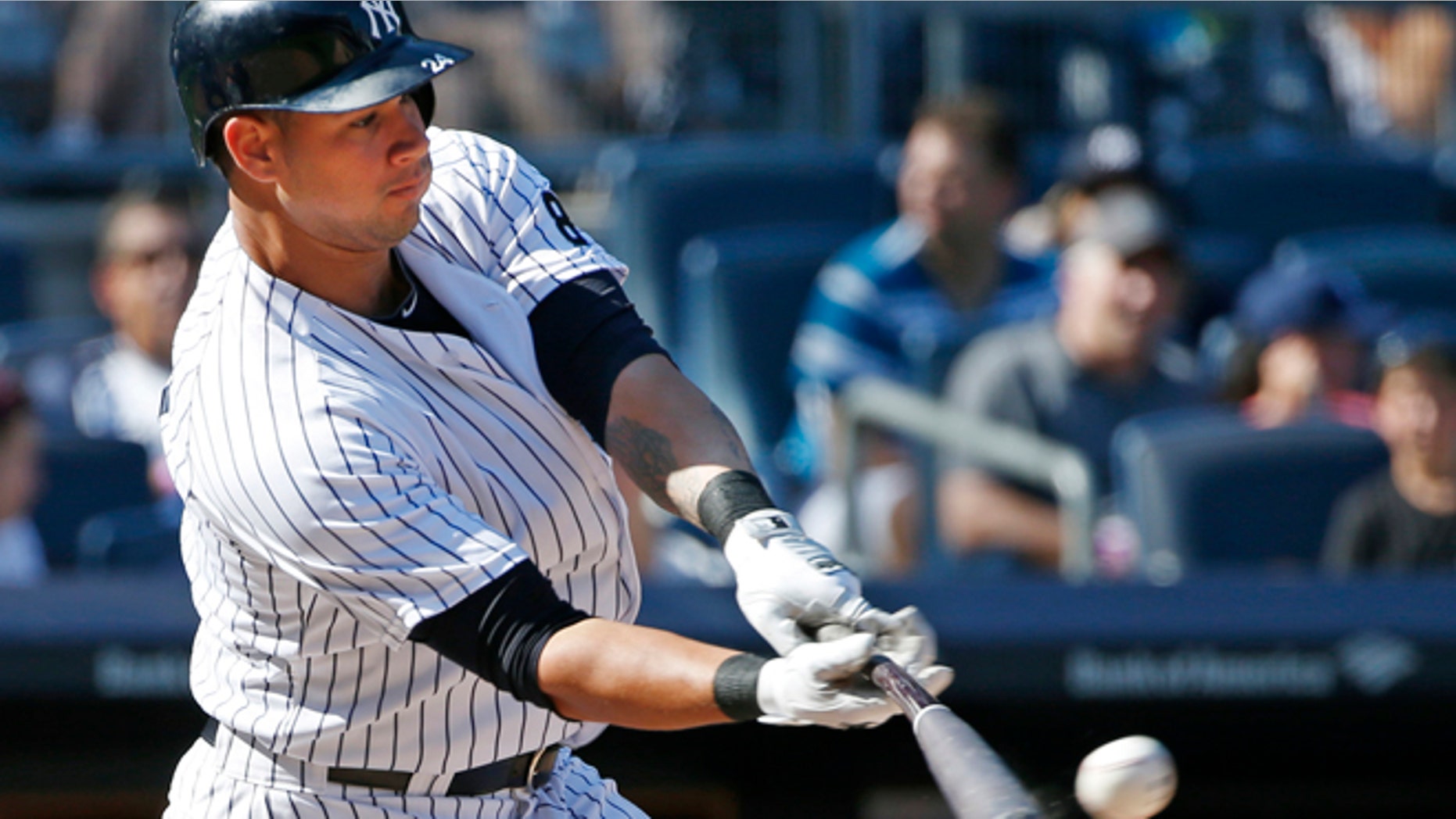New York Yankees designated hitter Gary Sanchez (24) hits an eighth-inning double in a baseball game against the Baltimore Orioles in New York, Sunday, Aug. 28, 2016. (AP Photo/Kathy Willens)