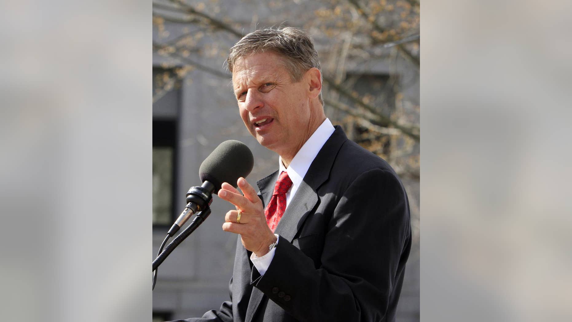 Former New Mexico Gov. Gary Johnson announces his plans to seek the Republican nomination for president in front of the Statehouse Thursday, April 21, 2011 in Concord, N.H. (AP Photo/Jim Cole)