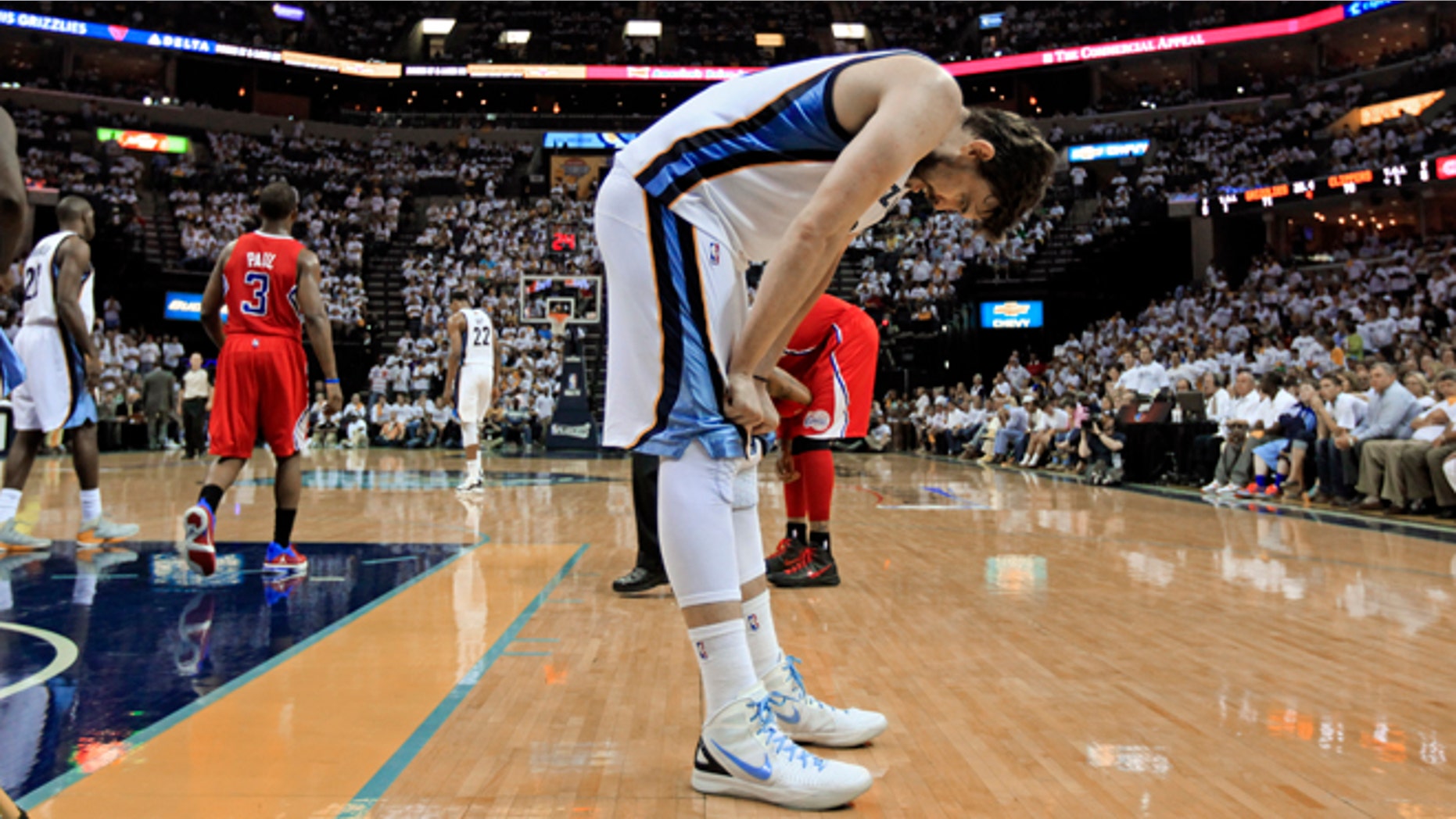 Memphis Grizzlies center Marc Gasol, of Spain, pauses on the court after the Grizzlies turned the ball over to the Los Angeles Clippers in the final seconds of the second half of Game 7 in a first-round NBA basketball playoff series on Sunday, May 13, 2012, in Memphis, Tenn. The Clippers won 82-72 to win the series 4-3.(AP Photo/Mark Humphrey)