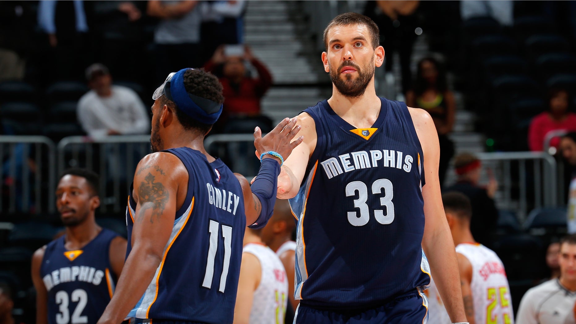 Mike Conley and Marc Gasol at Philips Arena on October 21, 2015 in Atlanta, Georgia.