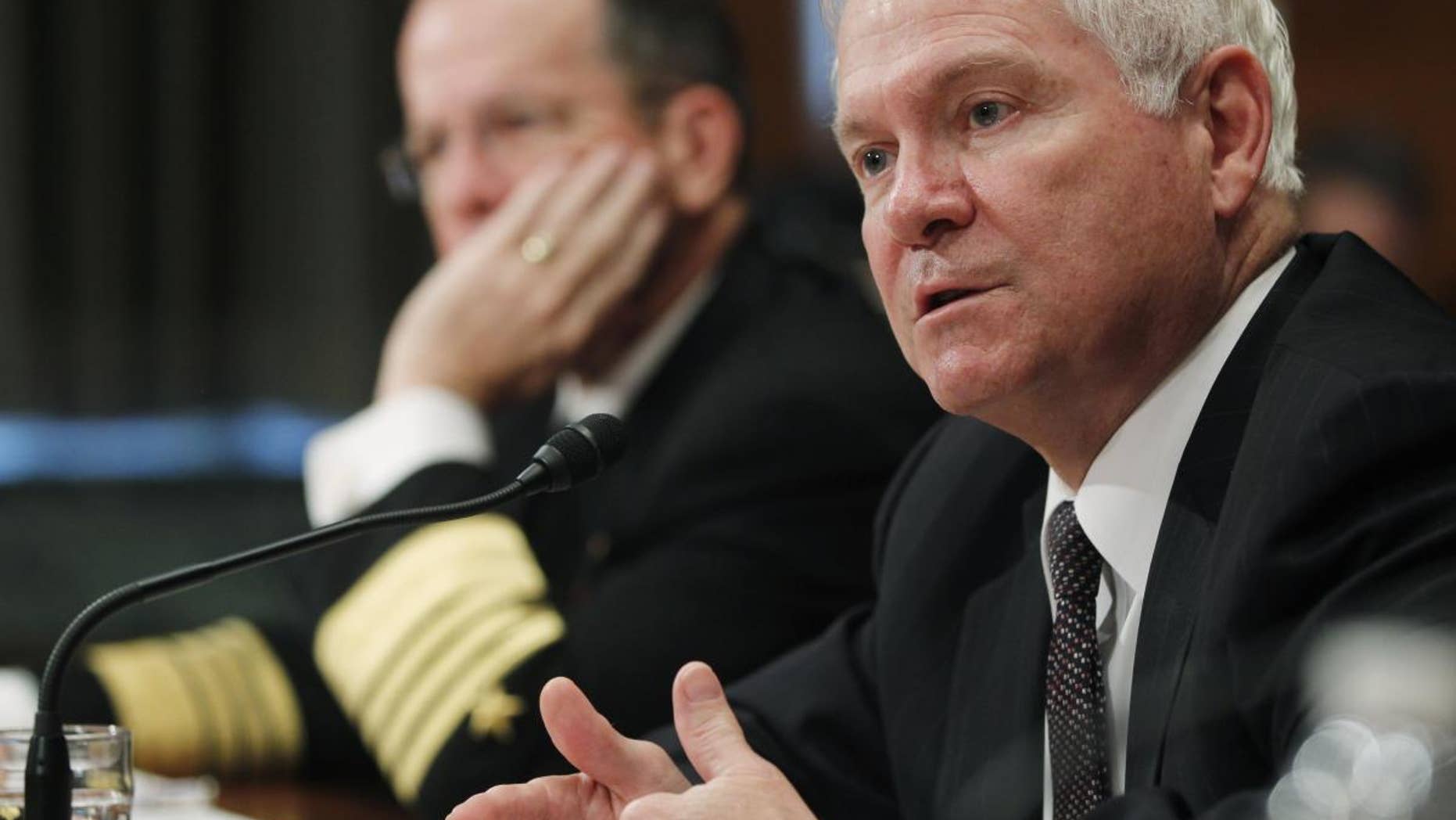 Secretary of Defense Robert Gates and Chairman of the Joint Chiefs of Staff Adm. Michael Mullen testify regarding the Department of Defense Fiscal Year 2012 budget request before the Senate Appropriations Committee Subcommittee on Defense on Capitol Hill in Washington, Wednesday, June 15, 2011. (AP Photo/Charles Dharapak)