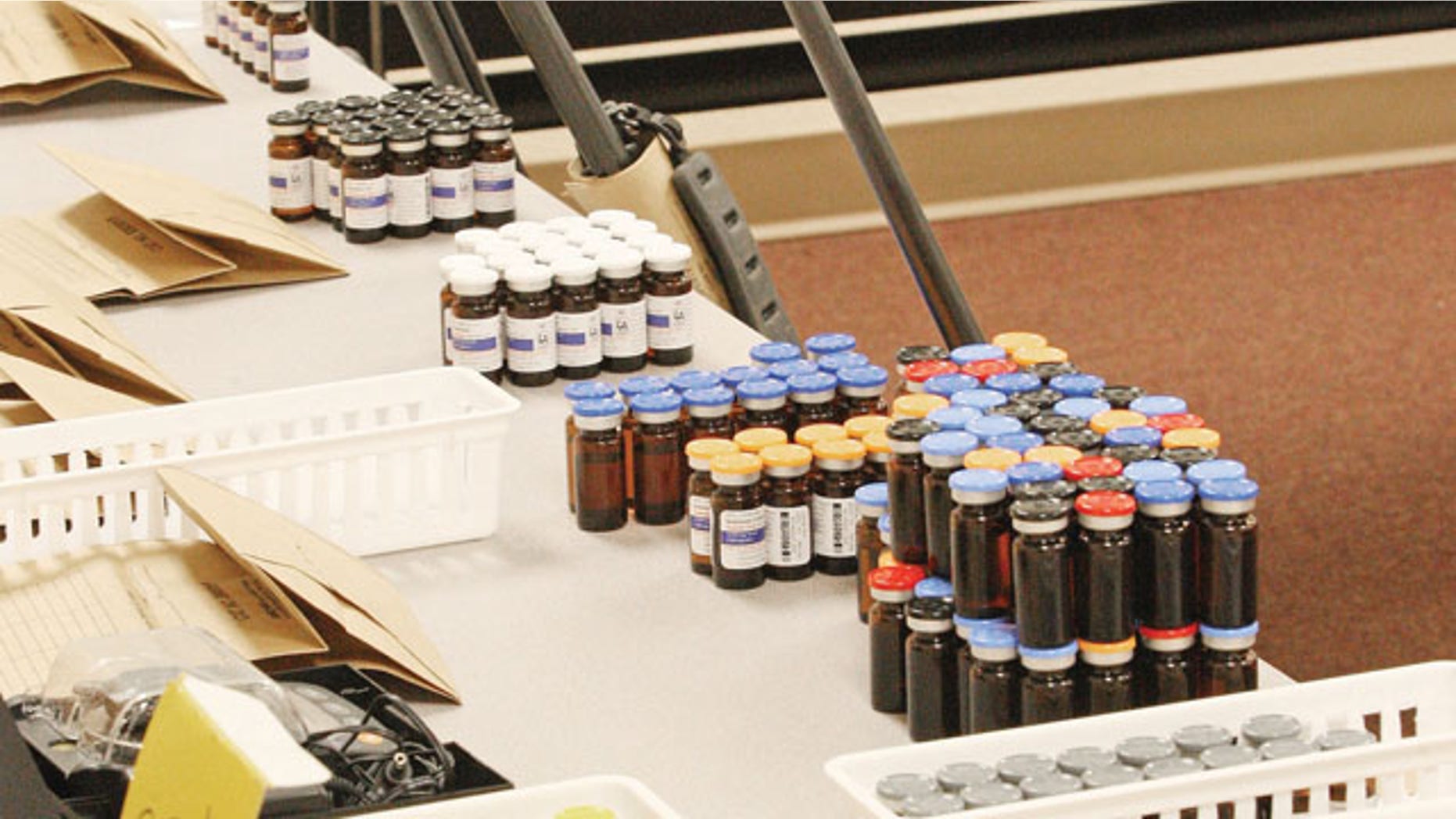 FILE - This Dec. 9, 2013 file photo shows vials of steroids during a news conference at the El Dorado Police Department in after multiple agencies shut down a large steroid manufacturing and distribution ring in El Dorado, Ark. (AP)