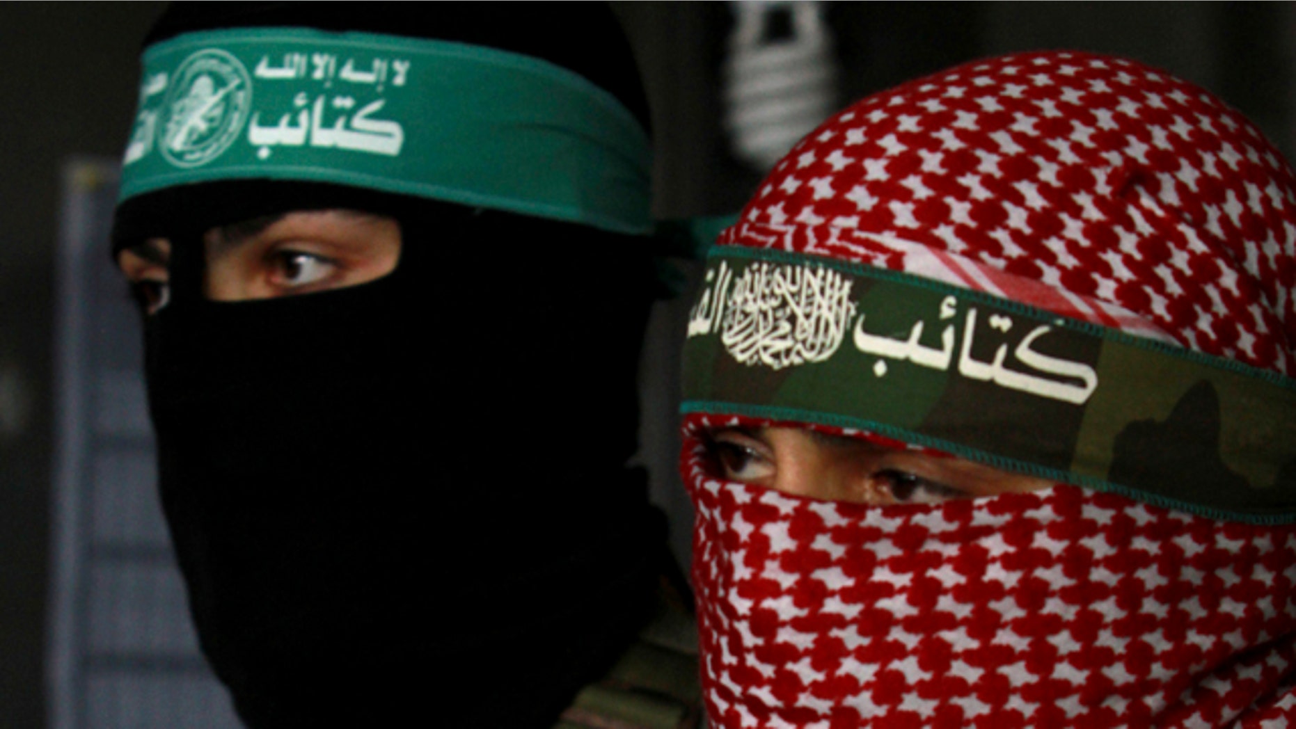 April 9: Masked Palestinian Hamas militants hold a press conference in Gaza City.