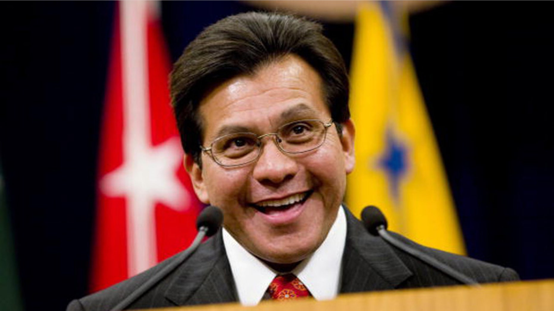 US Attorney General Alberto Gonzales speaks during a farewell ceremony in his honor.