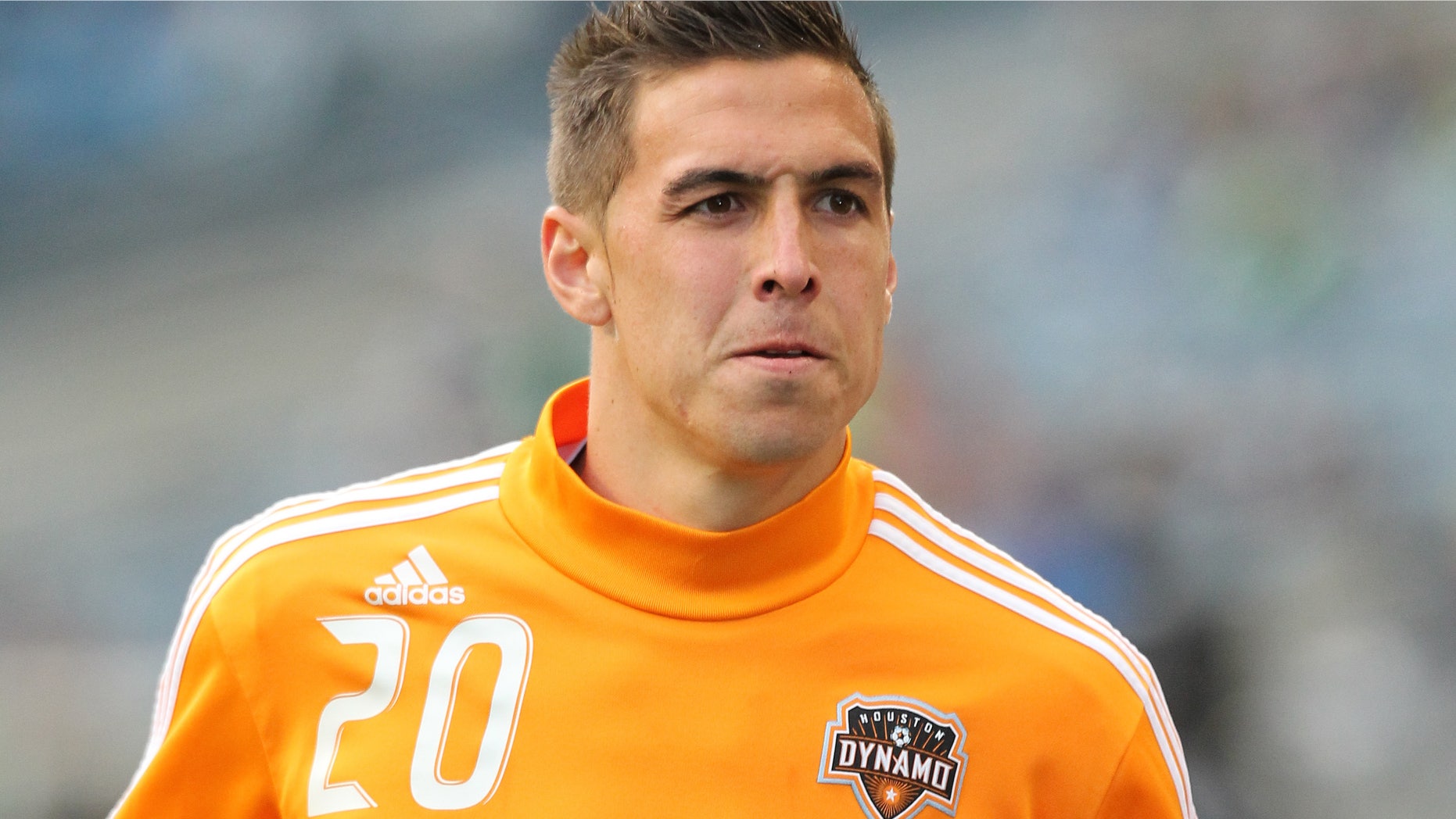 SEATTLE, WA - MARCH 25: Geoff Cameron #20 of the Houston Dynamo warms up prior to the game against the Seattle Sounders FC at Qwest Field on March 25, 2011 in Seattle, Washington. (Photo by Otto Greule Jr/Getty Images)