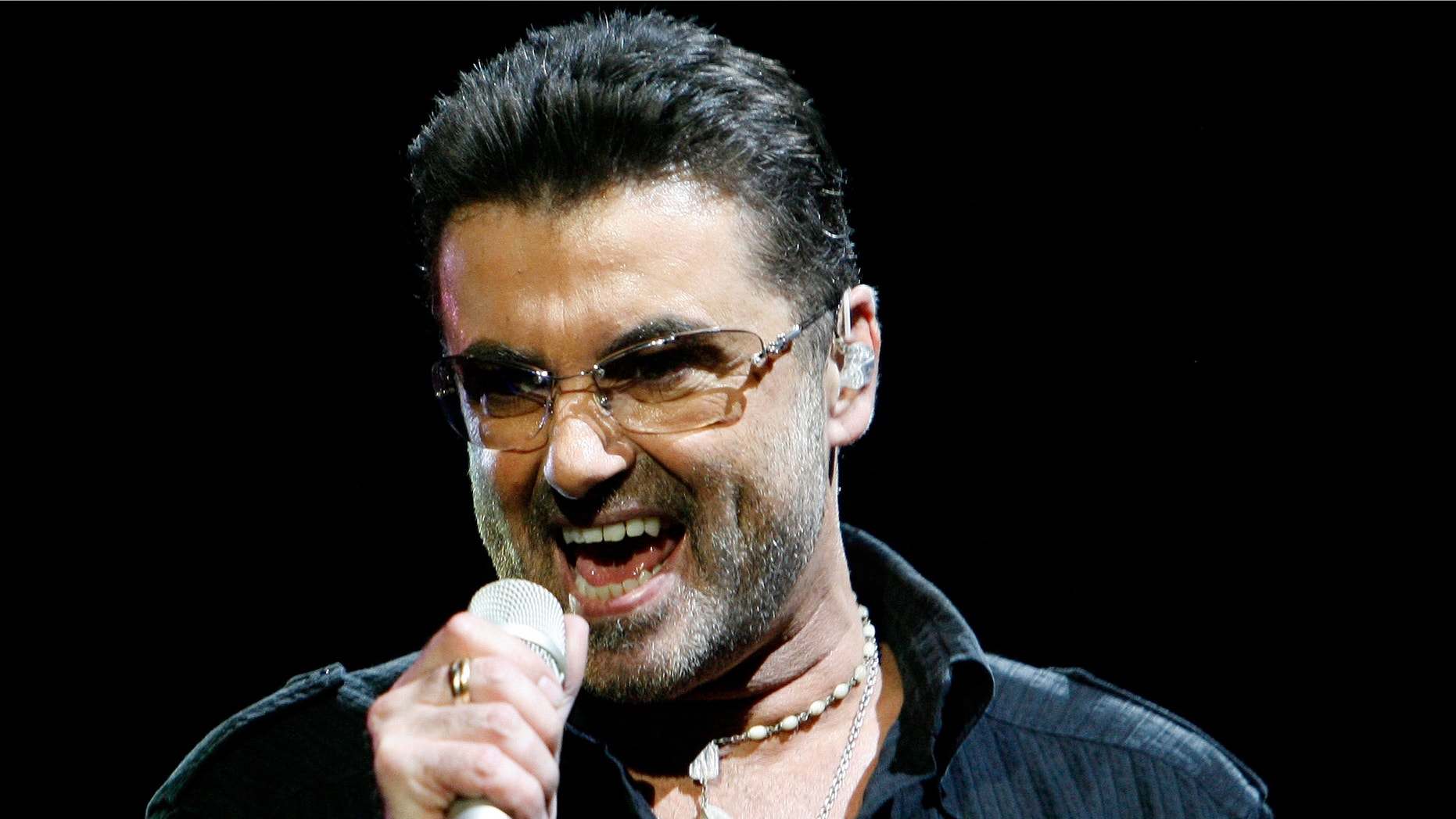 June 25, 2008: George Michael performs in concert at the Forum during his "Live Global Tour" in Inglewood, California. The singer was recently arrested in Britain on charges of drugs and driving offenses.