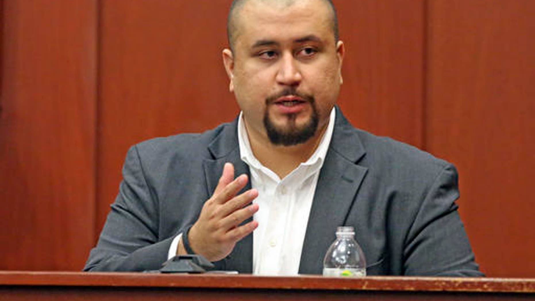 FILE - In this Sept. 13, 2016 file photo, George Zimmerman looks at the jury as he testifies in a Seminole County courtroom in Orlando, Fla. Authorities say a sheriff's deputy ordered Zimmerman to leave a central Florida bar, Wednesday, Nov. 9, after Zimmerman accused a black customer of hitting him and used a racial slur. (Red Huber/Orlando Sentinel via AP, Pool)