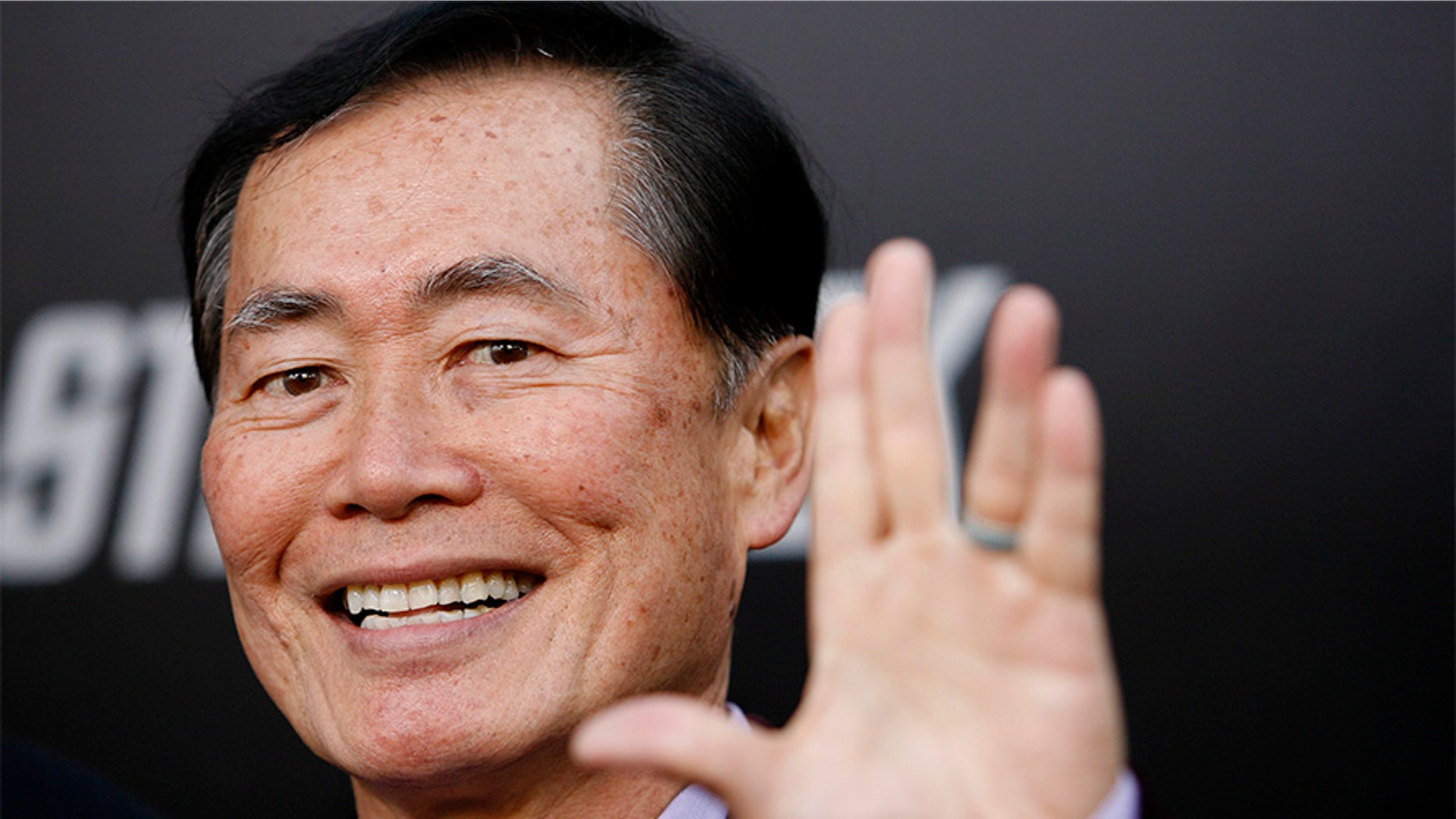 Actor George Takei gestures at the premiere of the movie "Star Trek" at the Grauman's Chinese theatre in Hollywood, California April 30, 2009. The movie opens in the U.S. on May 8. REUTERS/Mario Anzuoni (UNITED STATES ENTERTAINMENT) - GM1E55110TE01