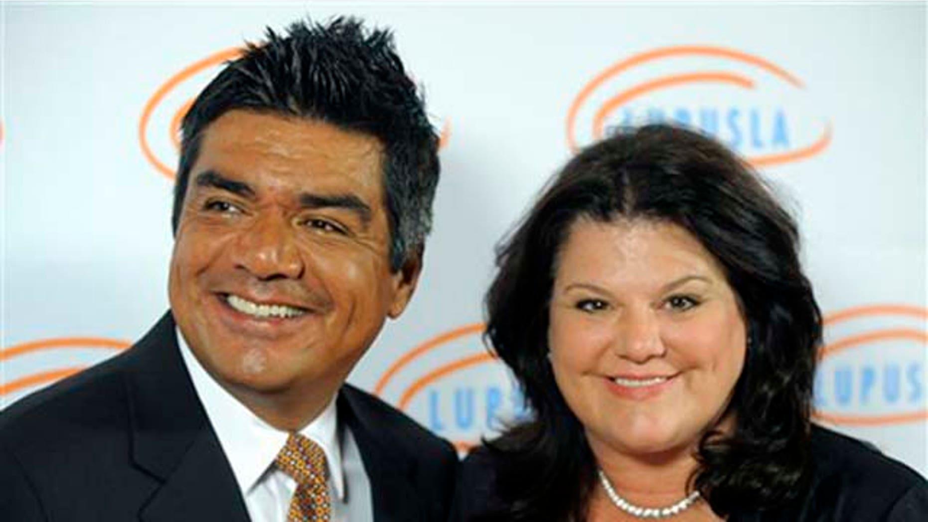FILE - In this May 6, 2010 file photo, TV personality George Lopez and his wife Ann arrive at the 10th Annual Lupus LA Orange Ball in Beverly Hills, Calif. (AP Photo/Chris Pizzello, file)