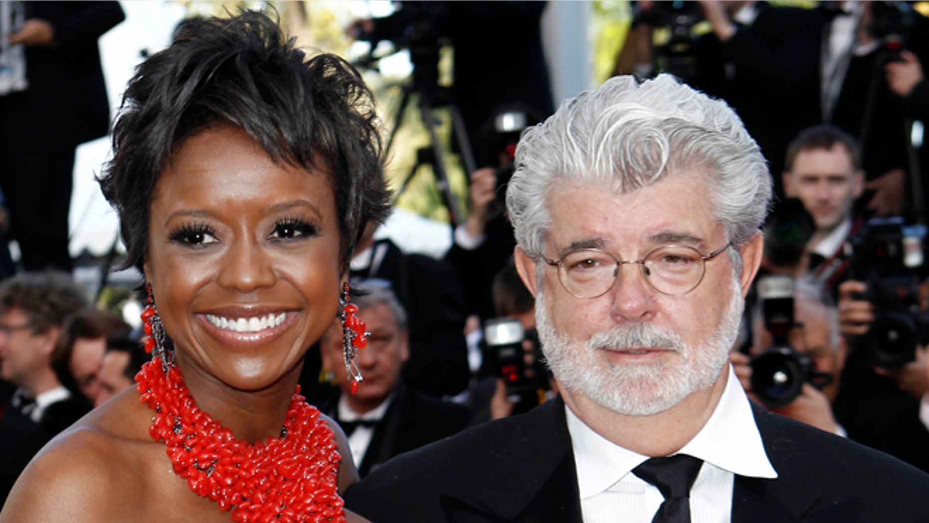 May 14, 2010: In this photo, Filmmaker George Lucas, right, and Mellody Hobson arrive for the screening of "Wall Street Money Never Sleeps", at the 63rd international film festival, in Cannes, southern France.