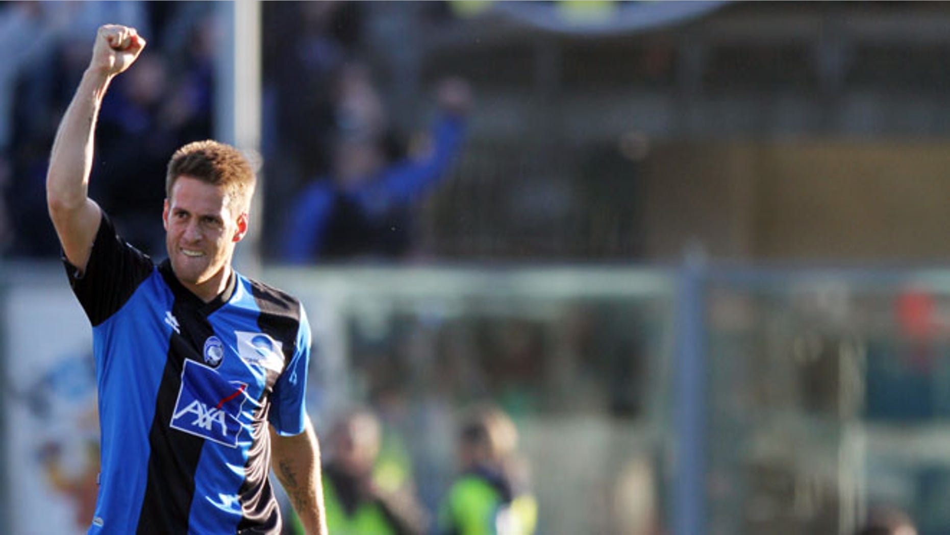 Atalanta's German Denis, of Argentina, reacts after scoring during a Serie A soccer match against AS Roma in Bergamo, Italy, Sunday, Feb. 26, 2012. (AP Photo/Felice Calabro')