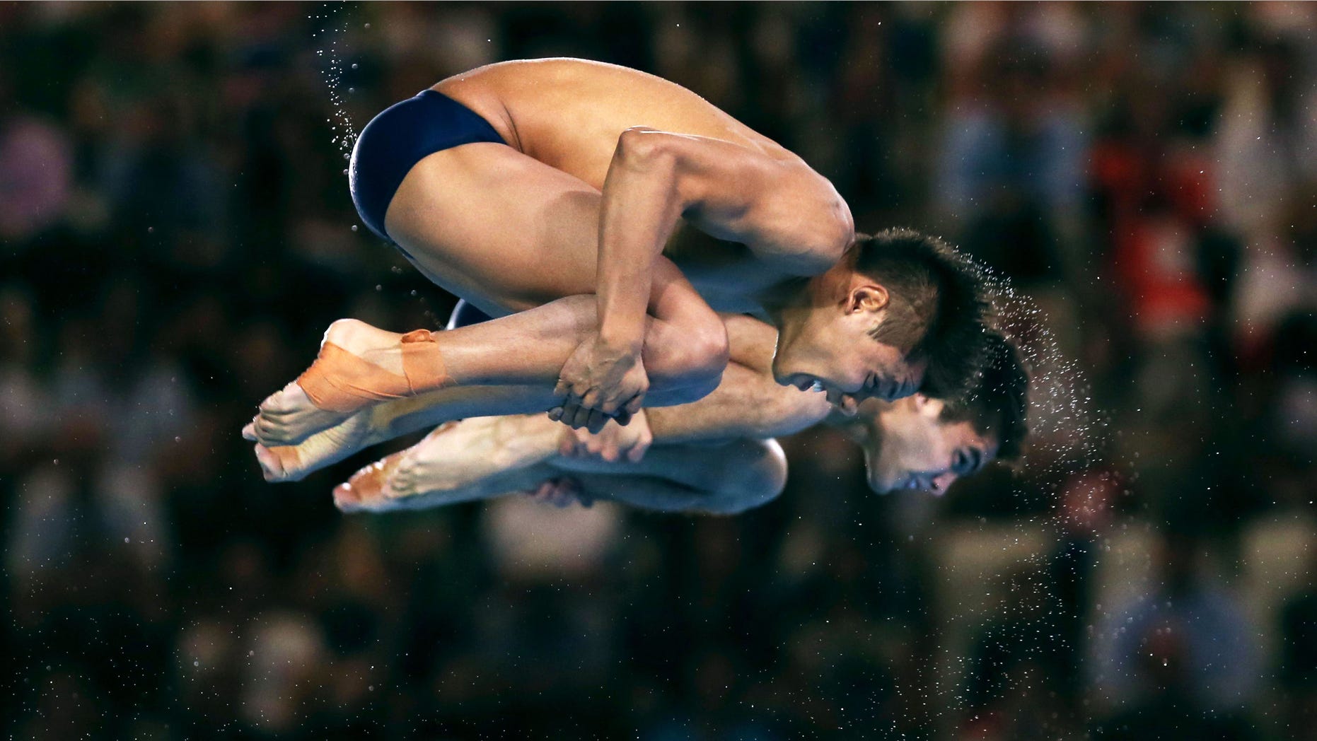 German Sanchez Sanchez (foreground) and Ivan Garcia Navarro of Mexico compete during the Men's Synchronised 10m Platform Diving on Day 3 of the London 2012 Olympic Games at the Aquatics Centre on July 30, 2012 in London, England.