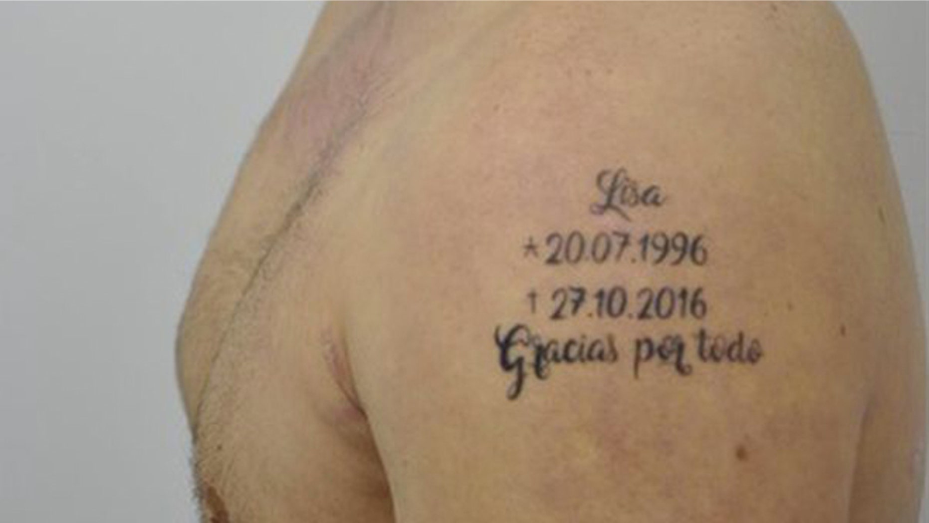 A close-up of the tell-tale tattoo. (Photo: Spain's Policia Nacional)