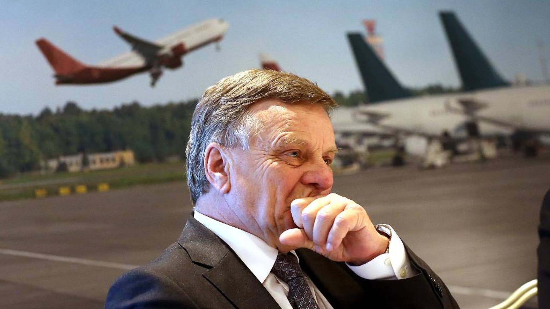 Airport CEO Hartmut Mehdorn answers journalists' questions in Motzen, Germany, Friday Dec. 12, 2014. Berlin’s new airport should be open within three years - barring further unforeseen problems. German news agency dpa quoted Rainer Bretschneider, the deputy chairman of the airport’s supervisory board, saying that it will begin operating in the second half of 2017. The airport was first scheduled to be ready late 2011 but that and three other opening dates were canceled due to technical problems. Costs, meanwhile, have more than doubled to some 5.4 billion euros (US $7.1 billion). (AP Photo/dpa,Wolfgang Kumm)