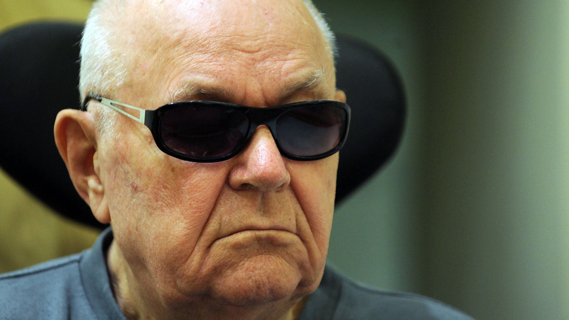 June 15: Accused Nazi death camp guard John Demjanjuk sits in a wheelchair as he arrives in a courtroom in Munich, southern Germany.