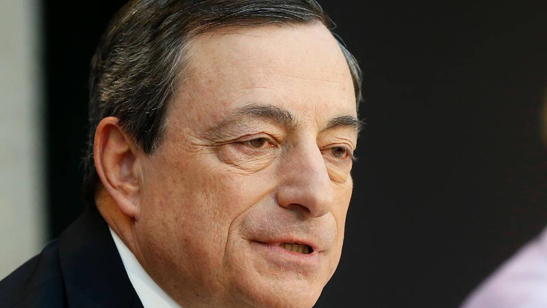 President of the European Central Bank, ECB, Mario Draghi speaks during a news conference in Frankfurt, Germany, Thursday, April 3, 2014, following a meeting of the ECB governing council. The ECB decided to leave its main interest rate unchanged. (AP Photo/Michael Probst)