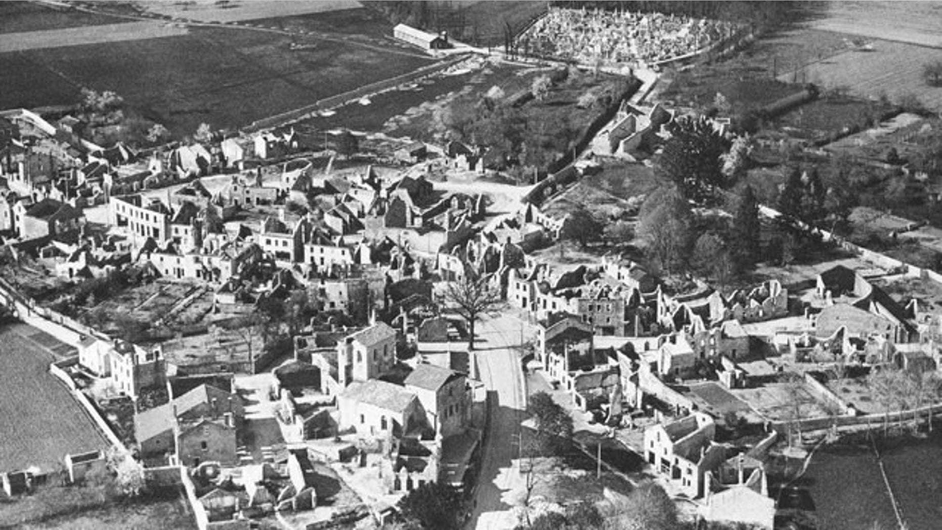 FILE - In this Jan. 1, 1953 b/w file picture, an aerial view of the destroyed Oradour-sur-Glane, in France is visible. In total, 642 men, women and children were killed here in reprisal for the French Resistance's kidnapping of a German soldier. (AP Photo,File)