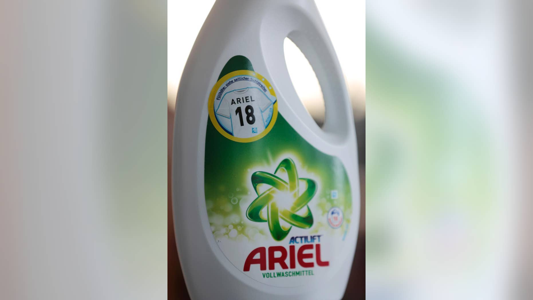 An Ariel liquid detergent bottle with an '18' on it sits in Berlin Germany, Friday, May 9, 2014. Detergent manufacturer Procter & Gamble has kicked up a froth in Germany after unintentionally placing a neo-Nazi code on promotional packages for Ariel washing powder. The use of Nazi slogans in public is banned in Germany, which neo-Nazis often try to circumvent by using codes. '18' stands for Adolf Hitler. (AP Photo/Ferdinand Ostrop)