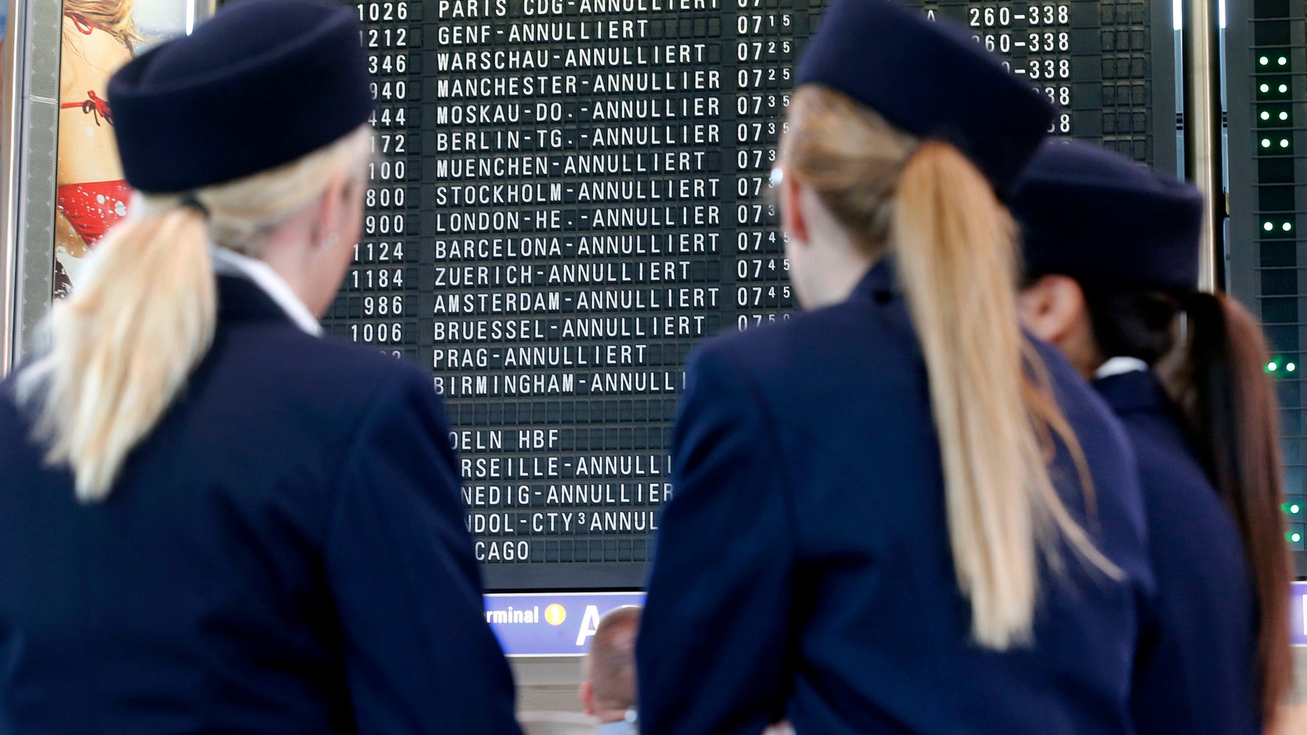 Canceled flights are displayed on a board as flight attendants of German Lufthansa airline go on an 24-hour strike for higher wages at the airport in Frankfurt, Germany, Friday, Sept. 7, 2012. Lufthansa canceled about 1,200 flights. (AP Photo/Michael Probst)