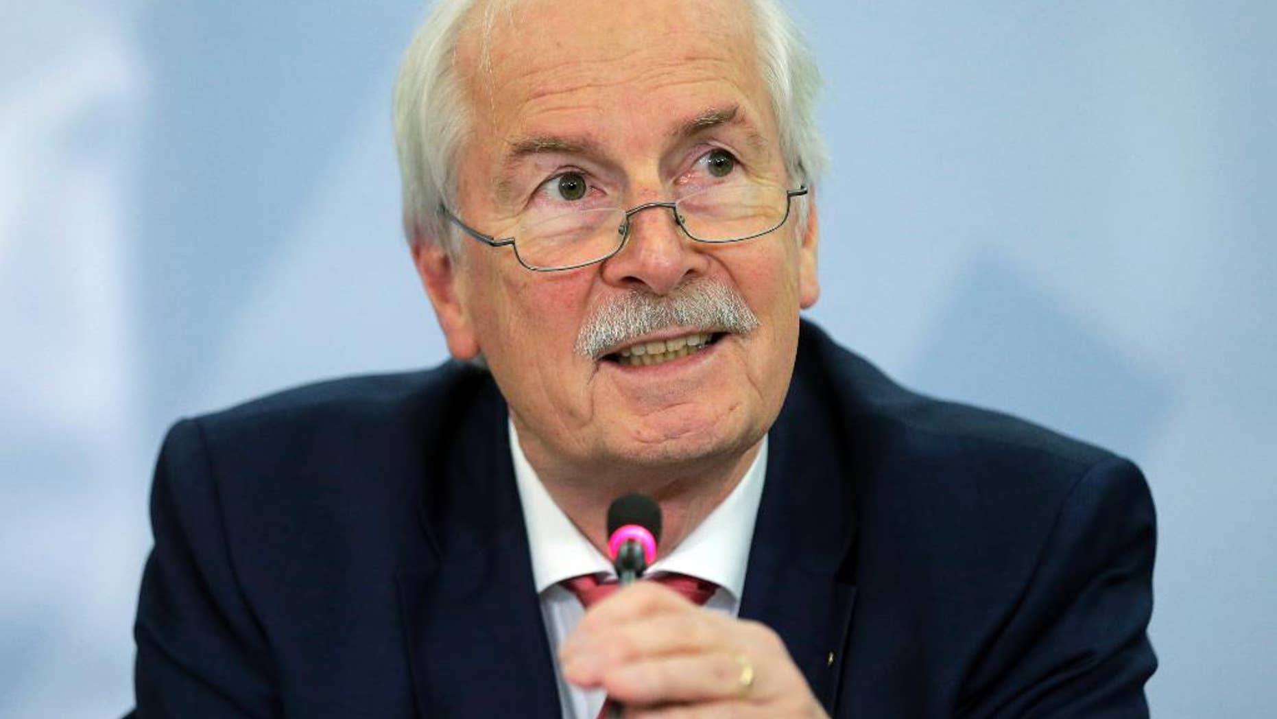 Germany's chief federal prosecutor Harald Range speaks during a news conference in Karlsruhe, Germany, Thursday, Nov. 11, 2014. Range said his office so far has found no actionable evidence that Chancellor Angela Merkel’s calls were tapped by the U.S. National Security Agency, but the investigation continues. (AP Photo/dpa, Ronald Wittek)
