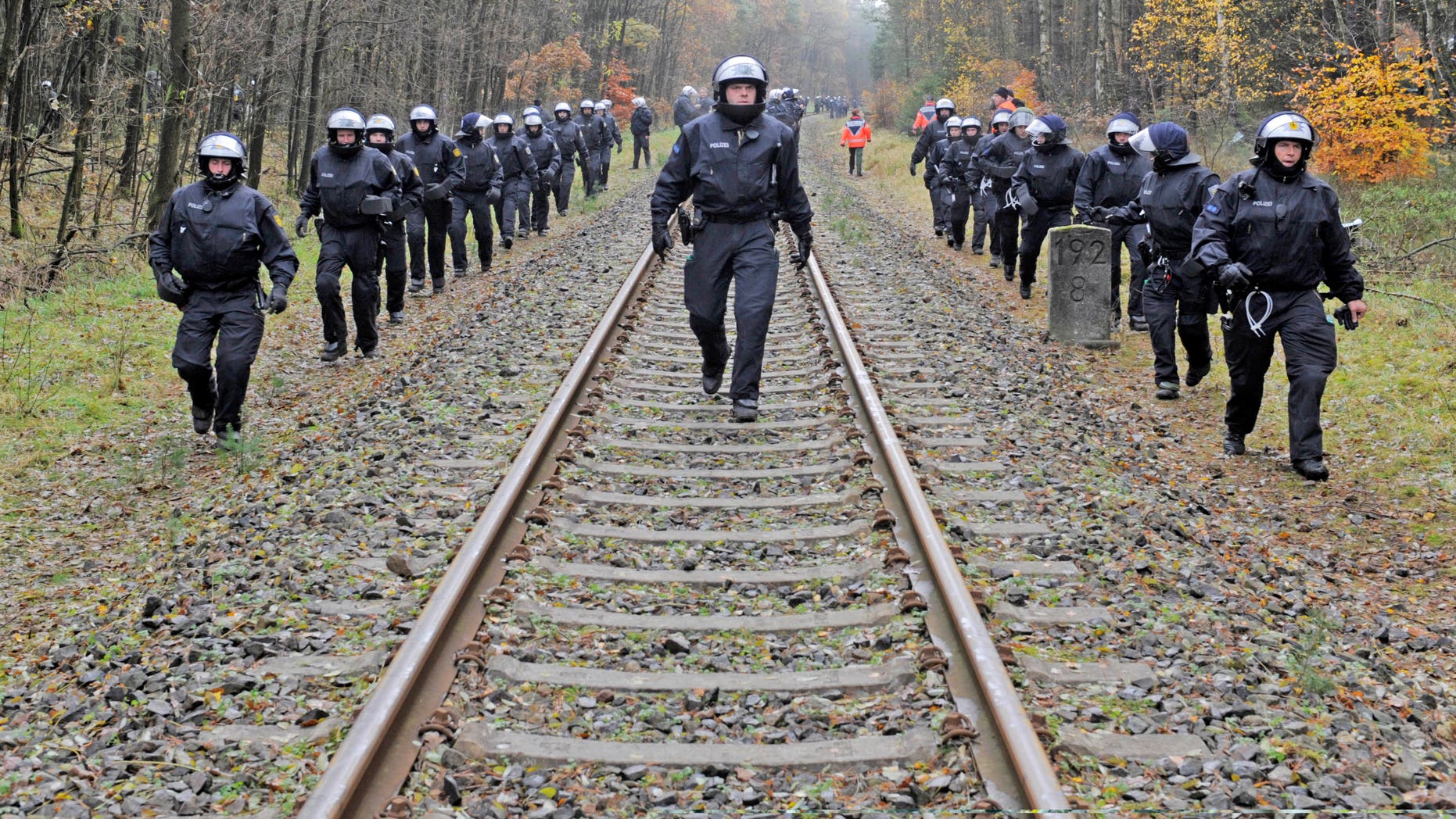 Nov. 7, 2011: Police officers secure the rails near Leitstade, Germany, prior to a nuclear waste transport passing through the area. German police are preparing a big security operation to protect a shipment of nuclear waste being moved to storage site next week, as protests are expected despite a decision to speed up the country's exit from nuclear energy.