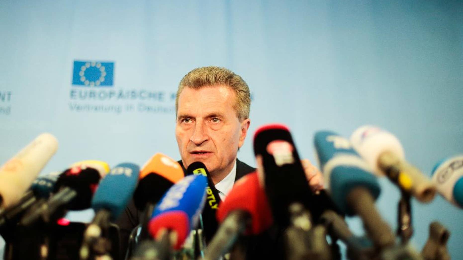 European Union energy commissioner Guenther Oettinger addresses a news conference as part of a meeting of the European Union, Russia's energy minister Alexander Novak and Ukraine's energy minister Yuri Prodan about Ukrainian future gas supply in Berlin, Friday, May 30, 2014. (AP Photo/Markus Schreiber)