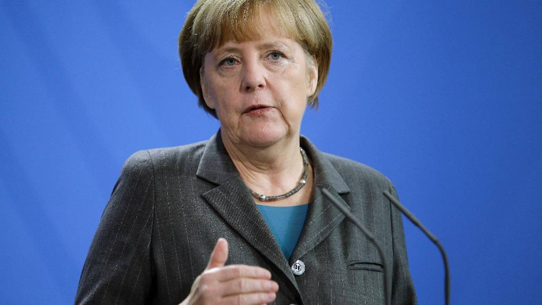 German Chancellor Angela Merkel speaks during a joint press conference as part of a meeting with Prime Minister of Slovenia Miro Cerar, at the chancellery in Berlin, Germany, Thursday, Oct. 30, 2014. (AP Photo/Michael Sohn)