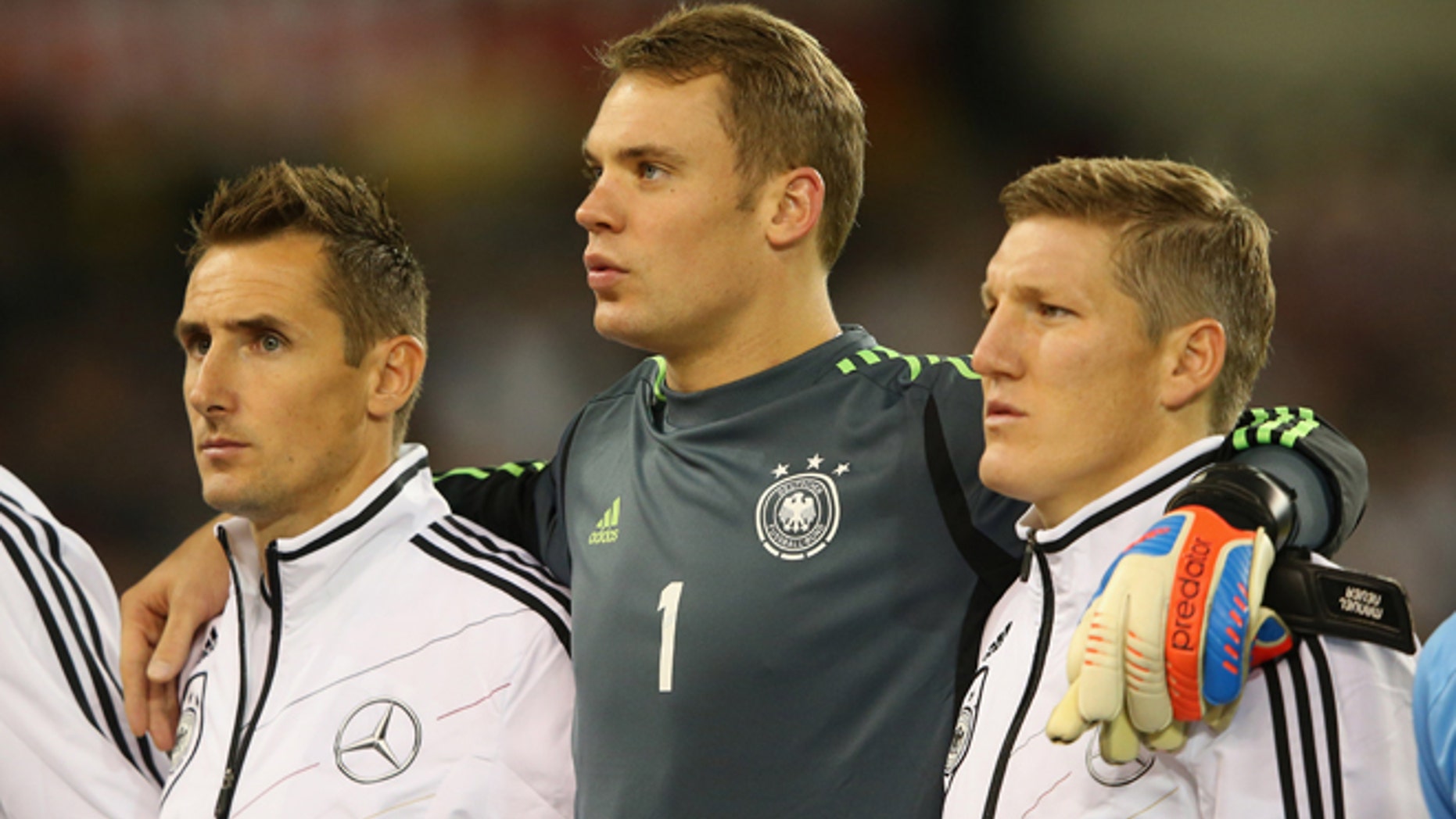 DUBLIN, IRELAND - OCTOBER 12: Miroslav Klose, Manuel Neuer and Bastian Schweinsteiger of Germany line up priorto the FIFA 2014 World Cup Qualifier Group C match between Republic of Ireland and Germany at the Aviva Stadium on October 12, 2012 in Dublin, Ireland. (Photo by Alex Livesey/Getty Images) *** Local Caption *** Miroslav Klose; Manuel Neuer; Bastian Schweinsteiger