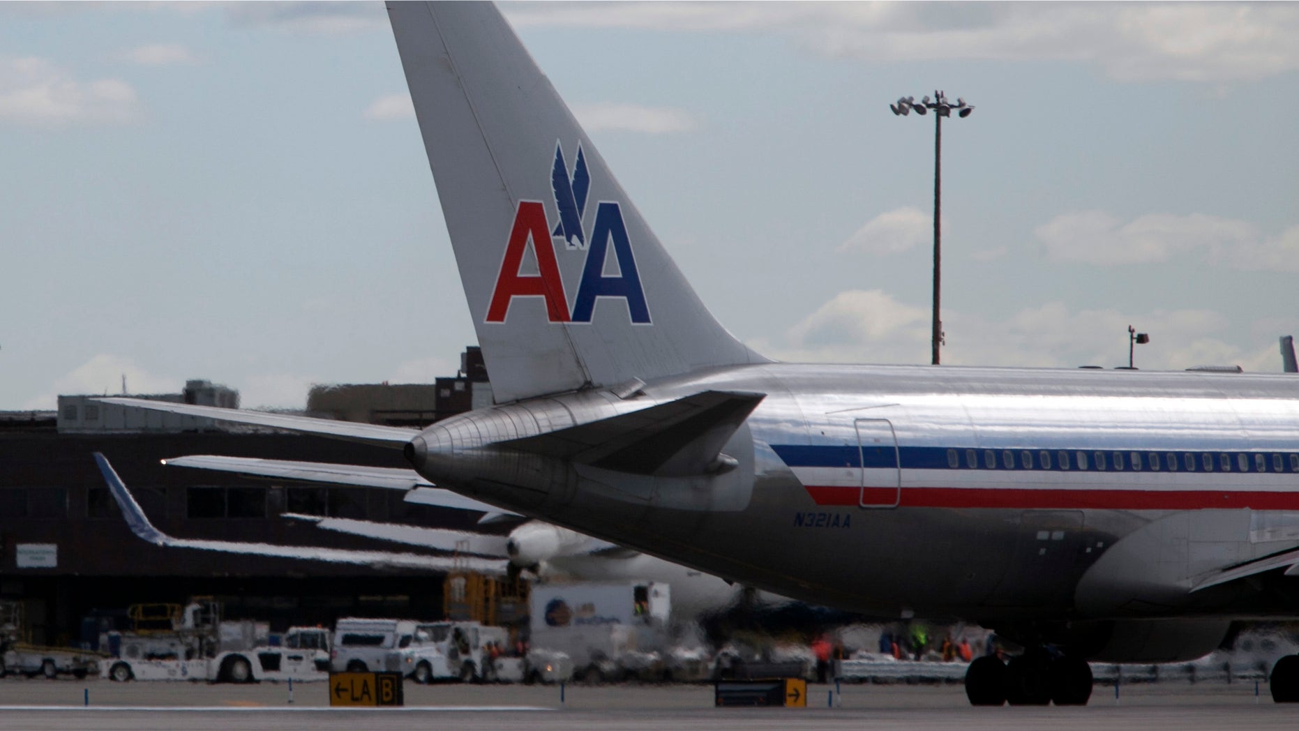 NEW YORK, NY - APRIL 27: An American Airlines plane is seen at John F. Kennedy International Airport April 27, 2012 in the Queens borough of New York City. (Photo by Allison Joyce/Getty Images)