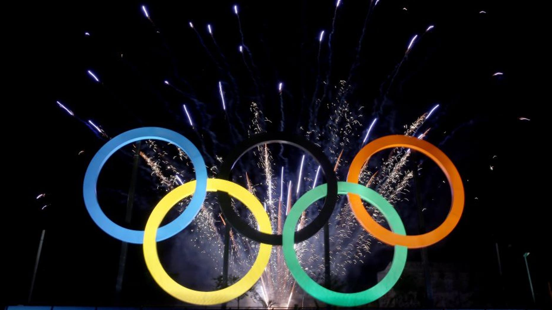 RIO DE JANEIRO, BRAZIL - MAY 20: The Olympic Rings are unveiled at a ceremony at Madureira Park May 20, 2015 in Rio de Janeiro, Brazil. (Photo by Matthew Stockman/Getty Images)