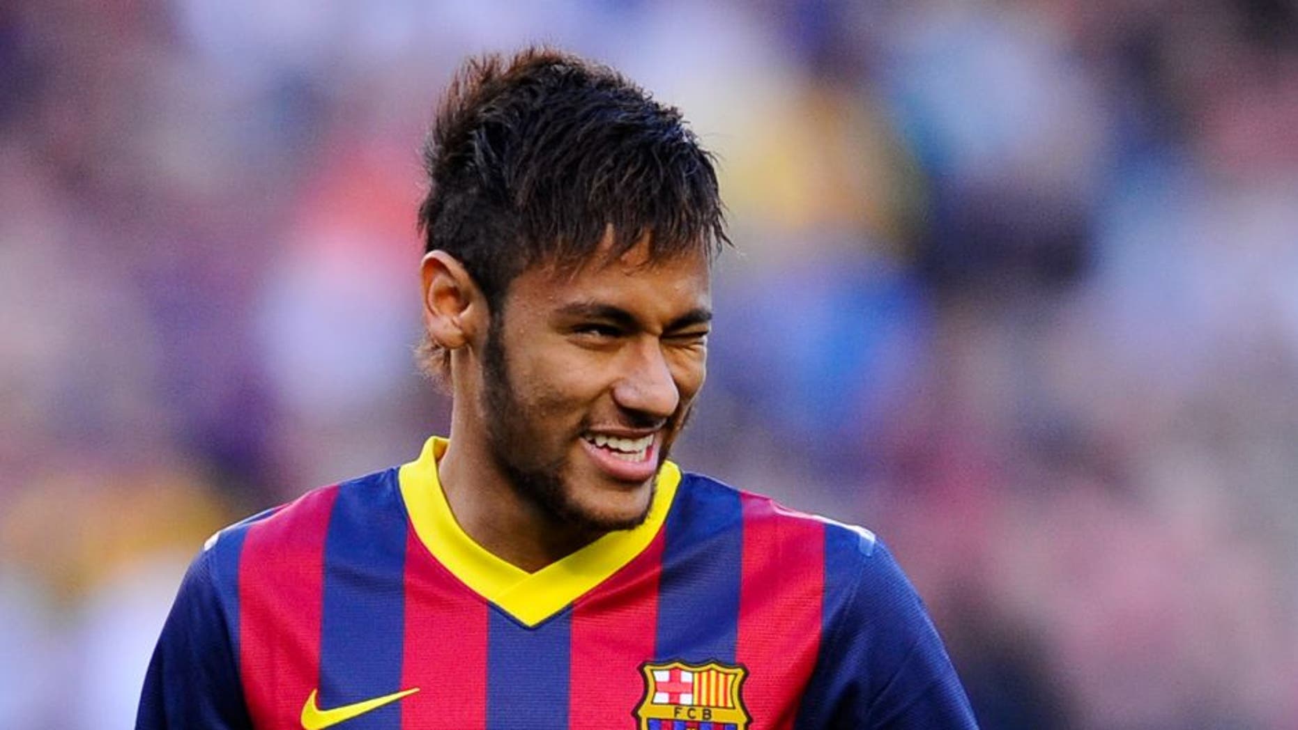 BARCELONA, SPAIN - APRIL 05: Neymar of FC Barcelona winks at his teammates during the La Liga match between FC Barcelona and Real Betis Balompie at Camp Nou on April 5, 2014 in Barcelona, Spain. (Photo by David Ramos/Getty Images)