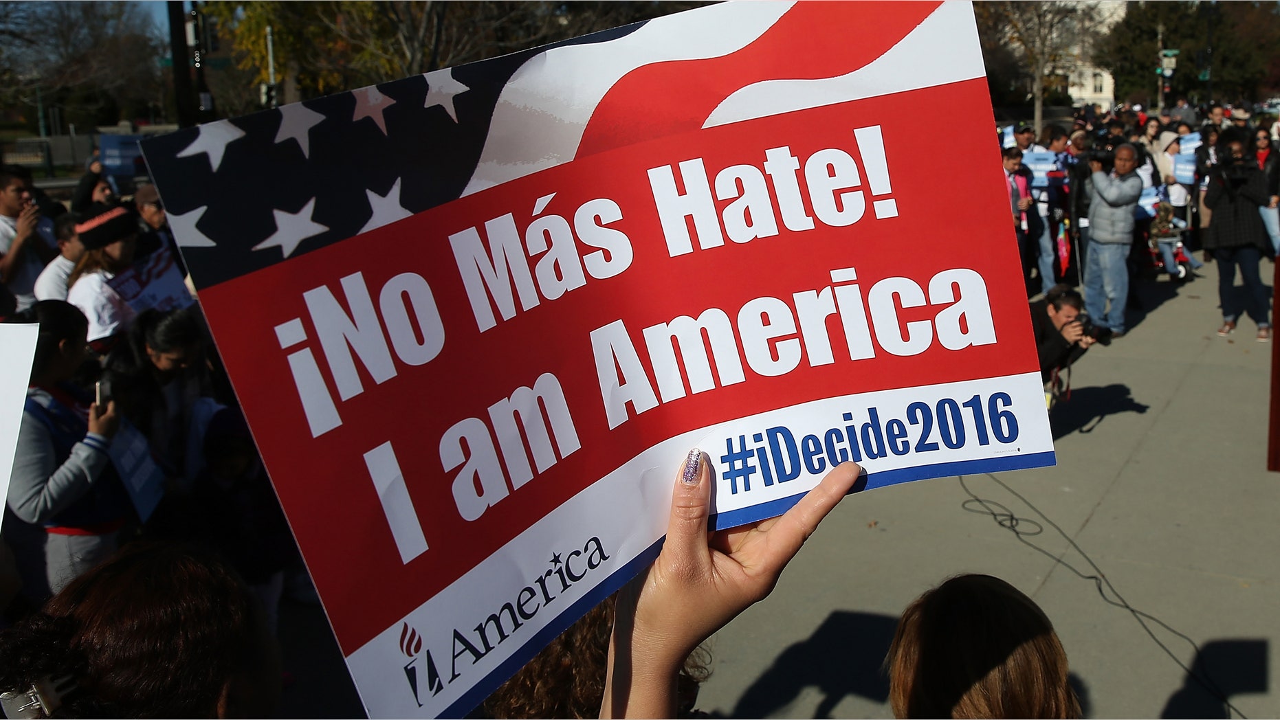 WASHINGTON, DC - NOVEMBER 20: Supporters of immigration reform protest outside the U.S. Supreme Court November 20, 2015 in Washington, DC. The protesters demanded the implementation of U.S. President Barack Obama's immigration relief programs, including the Deferred Action for Parents of Americans and Lawful Permanent Residents and expanded Deferred Action for Childhood Arrivals, during the protest. (Photo by Win McNamee/Getty Images)
