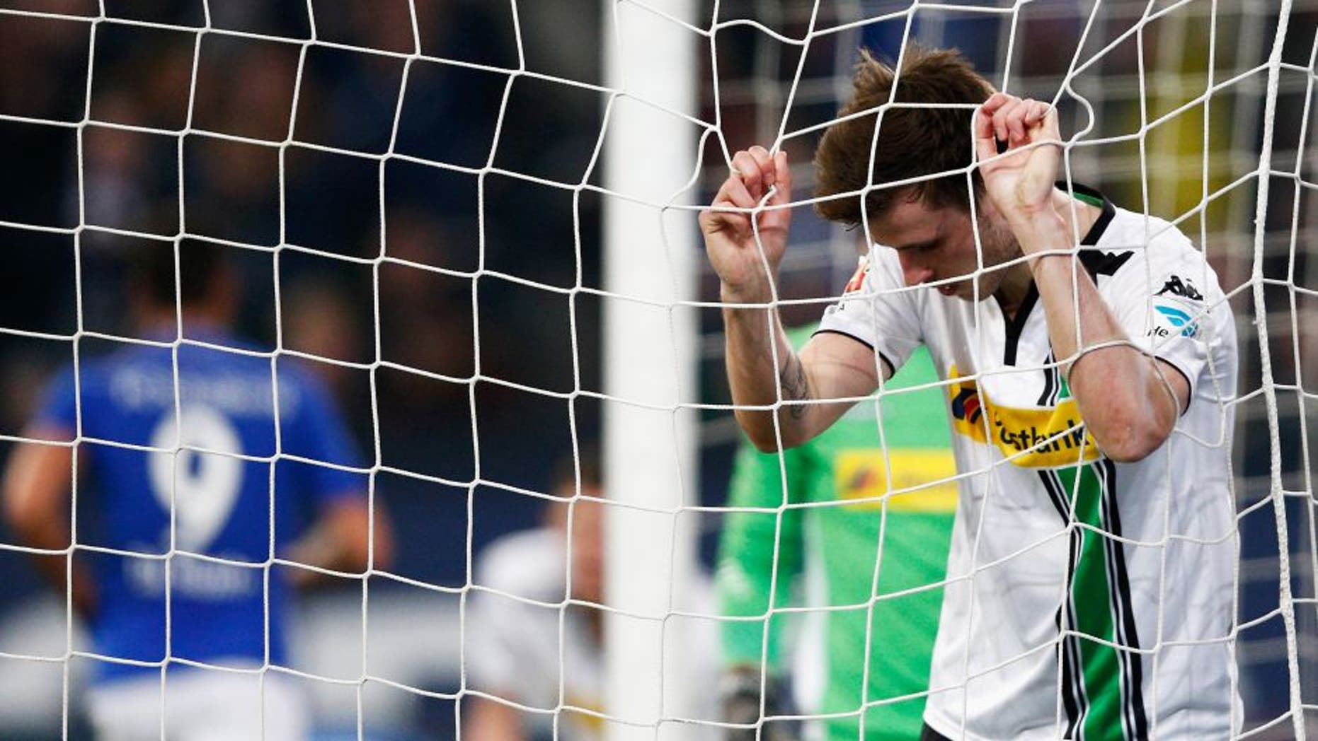 GELSENKIRCHEN, GERMANY - MARCH 18: Havard Nordtveit of Borussia Monchengladbach looks dejected after team mate Martin Hinteregger scores and own goal during the Bundesliga match between FC Schalke 04 and Borussia Moenchengladbach held at Veltins-Arena on March 18, 2016 in Gelsenkirchen, Germany. (Photo by Dean Mouhtaropoulos/Bongarts/Getty Images)