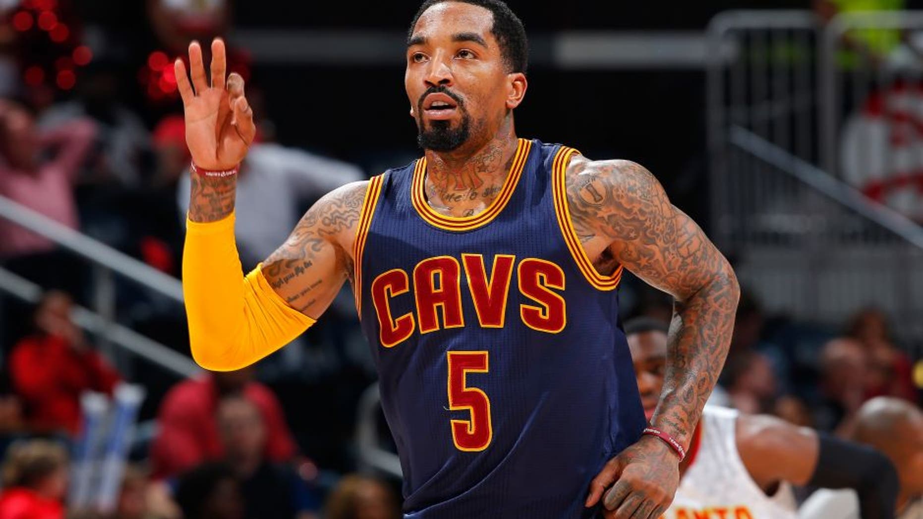 ATLANTA, GEORGIA - APRIL 01: J.R. Smith #5 of the Cleveland Cavaliers reacts after hitting a three-point basket against the Atlanta Hawks at Philips Arena on April 1, 2016 in Atlanta, Georgia. NOTE TO USER User expressly acknowledges and agrees that, by downloading and or using this photograph, user is consenting to the terms and conditions of the Getty Images License Agreement. (Photo by Kevin C. Cox/Getty Images)