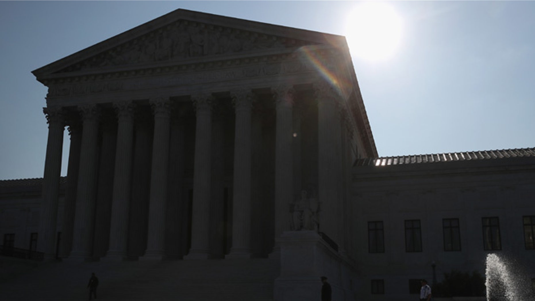 WASHINGTON, DC - MAY 16: The early morning sun rises behind the U.S. Supreme Court building May 15, 2016 in Washington, DC. Today the high court sent the Affordable Care Act's contraceptive mandate case back down to the lower courts for opposing parties to work out a compromise. (Photo by Mark Wilson/Getty Images)