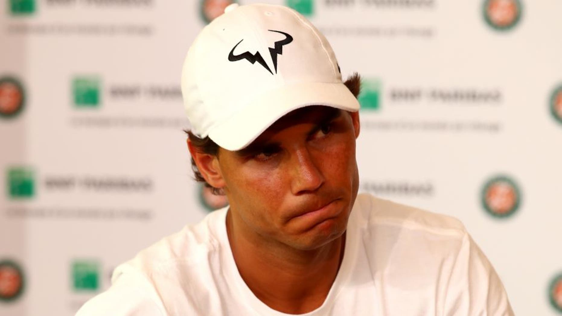 PARIS, FRANCE - MAY 27: Rafael Nadal of Spain announces during a press conference that he is withdrawing from the tournament due to a wrist injury on day six of the 2016 French Open at Roland Garros on May 27, 2016 in Paris, France. (Photo by Clive Brunskill/Getty Images)