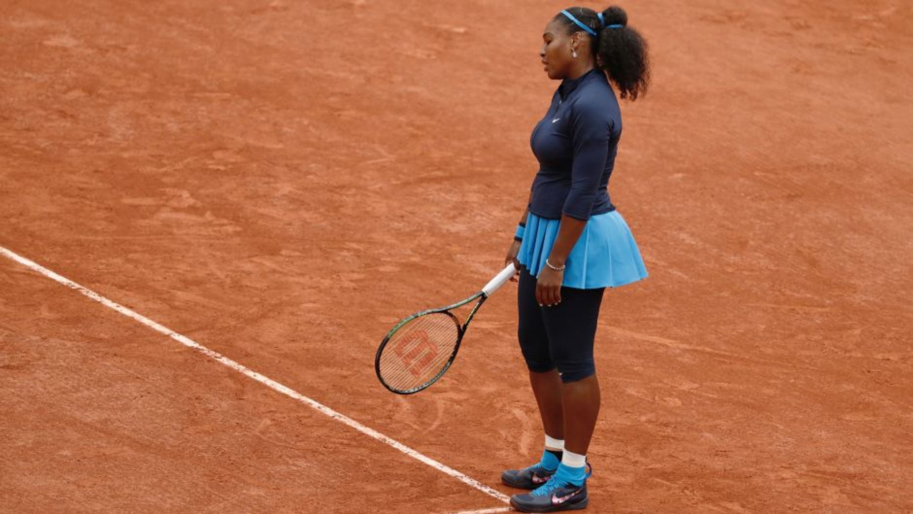 The US's Serena Williams reacts during her women's final match against Spain's Garbine Muguruza at the Roland Garros 2016 French Tennis Open in Paris on June 4, 2016. / AFP / Thomas SAMSON (Photo credit should read THOMAS SAMSON/AFP/Getty Images)