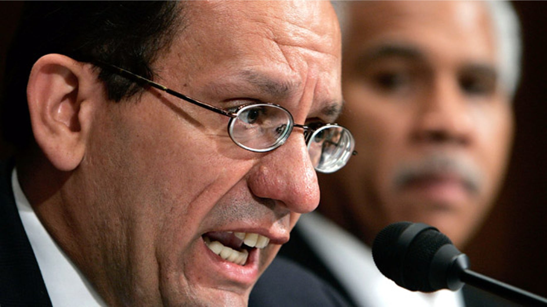 WASHINGTON - SEPTEMBER 20: Eddie Perez (L) mayor of Hartford, Connecticut speaks about eminent domain as Hilary Shelton (R), Director, NAACP Washington, listens during a Senate Judiciary Committee on Capitol Hill September 20, 2005 in Washington DC. The committee is hearing testimony on the Kelo decision and investigating the taking of homes and other private property. (Photo by Mark Wilson/Getty Images)