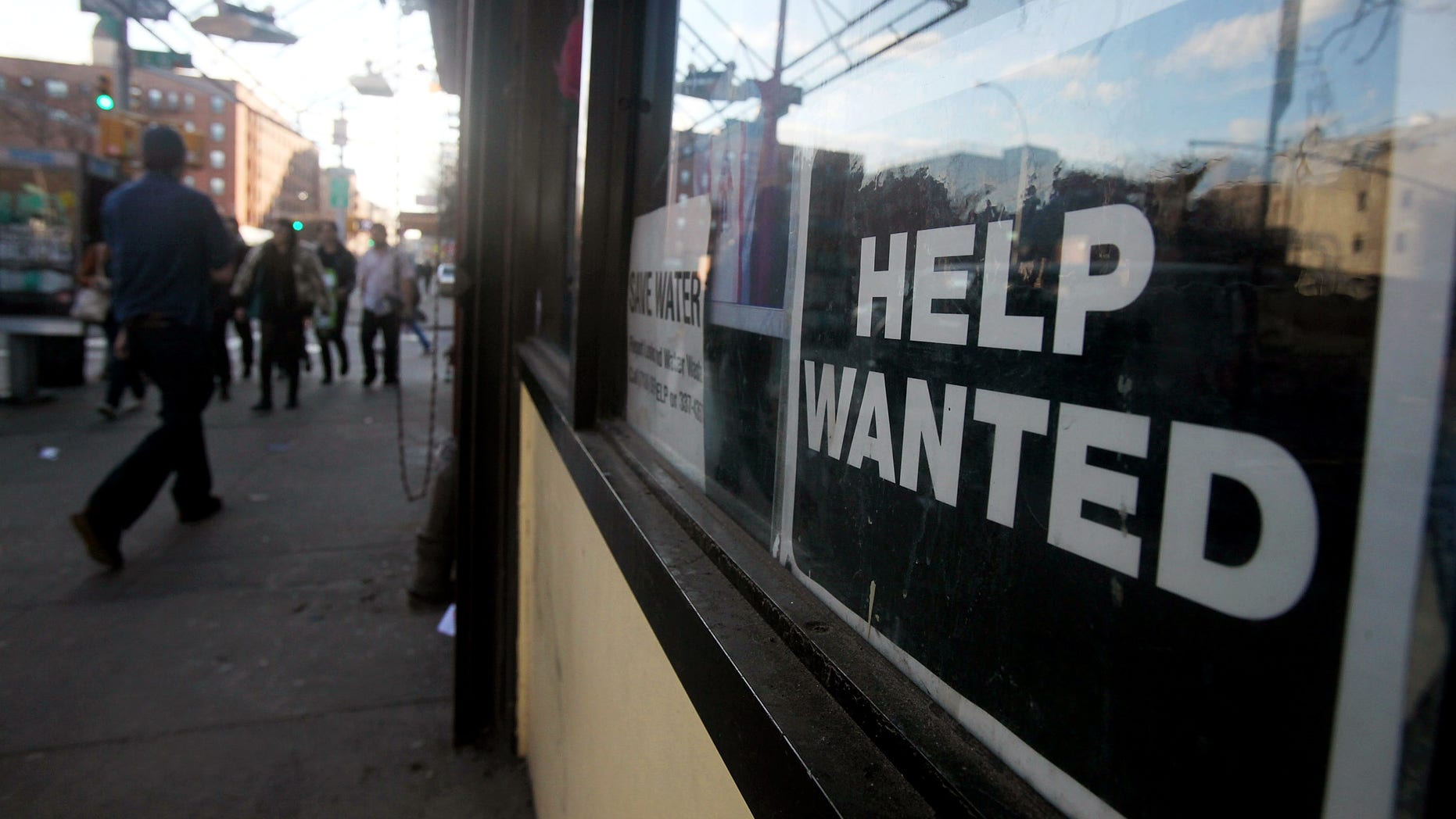 NEW YORK - MARCH 09: A 'help wanted' sign is seen in the window of a laundromat March 9, 2010 in New York City. United States job openings increased in January by 193,000 to 2.72 million, the highest level in almost a year, in a signal that economic recovery is continuing. (Photo by Mario Tama/Getty Images)