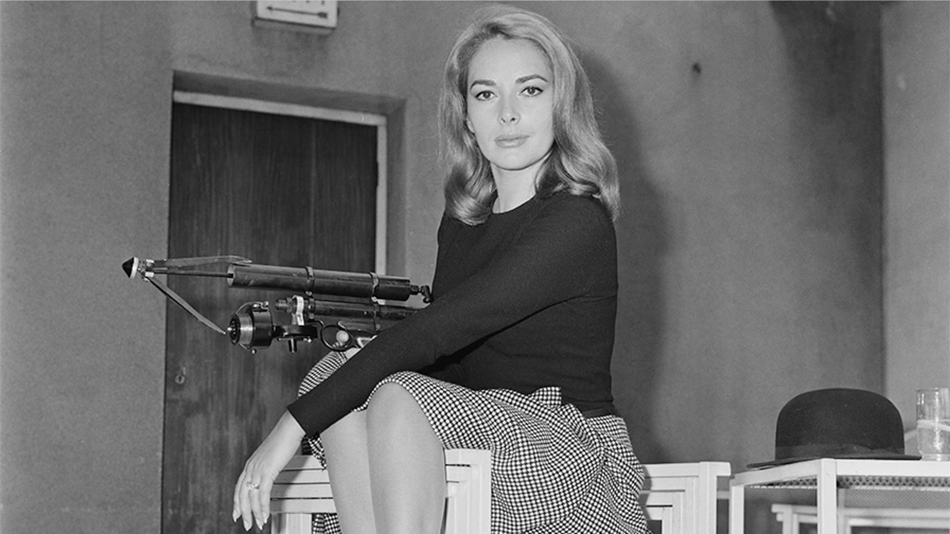 German actress Karin Dor holding a harpoon gun, 6th October 1966. She is starring in the James Bond film 'You Only Live Twice'. (Photo by Larry Ellis/Express/Hulton Archive/Getty Images)