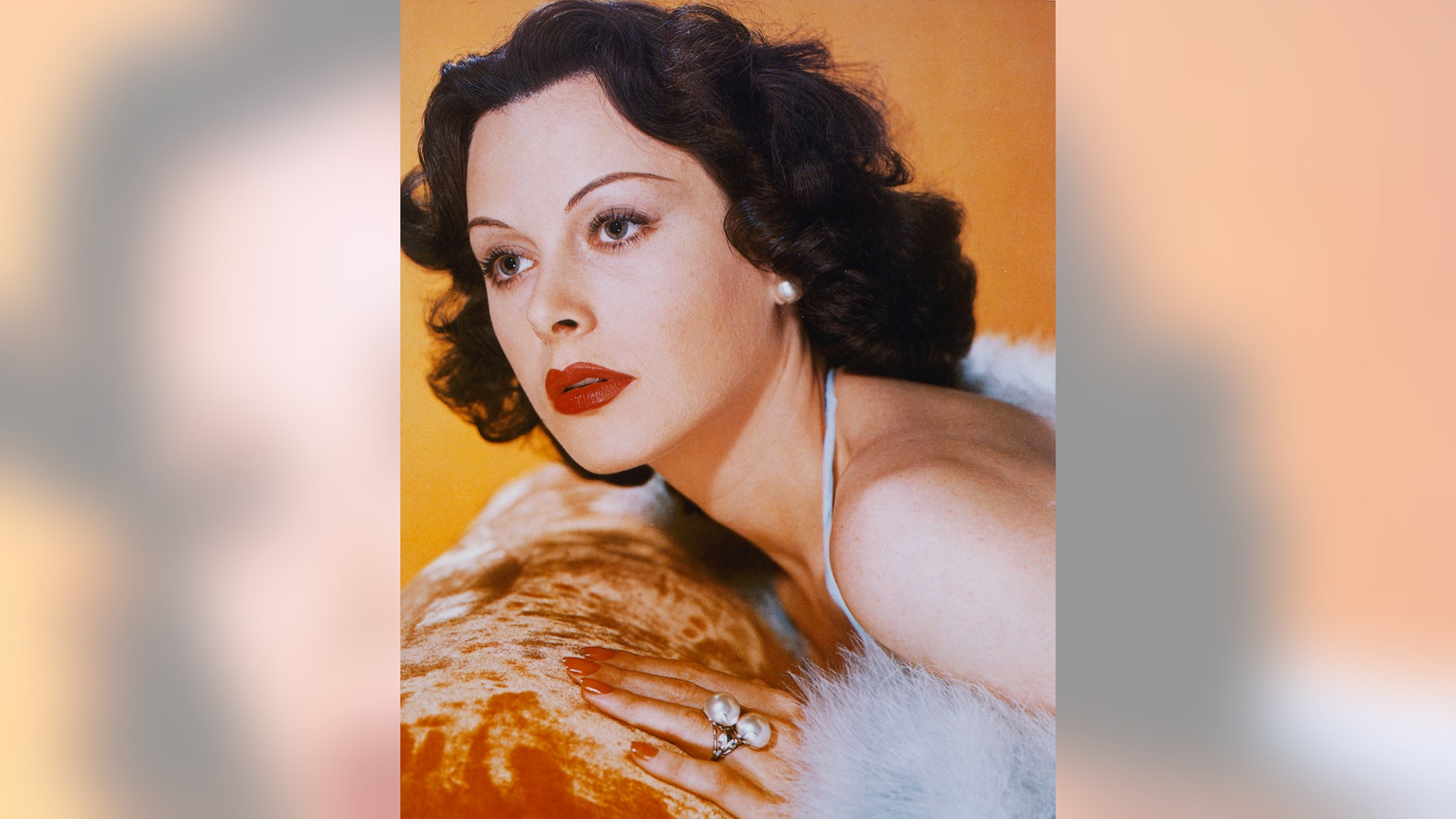Headshot of Hedy Lamarr (1913-2000), Austrian actress, leaning against velour-covered surface, in a studio portrait, 1940. (Photo by Silver Screen Collection/Getty Images)
