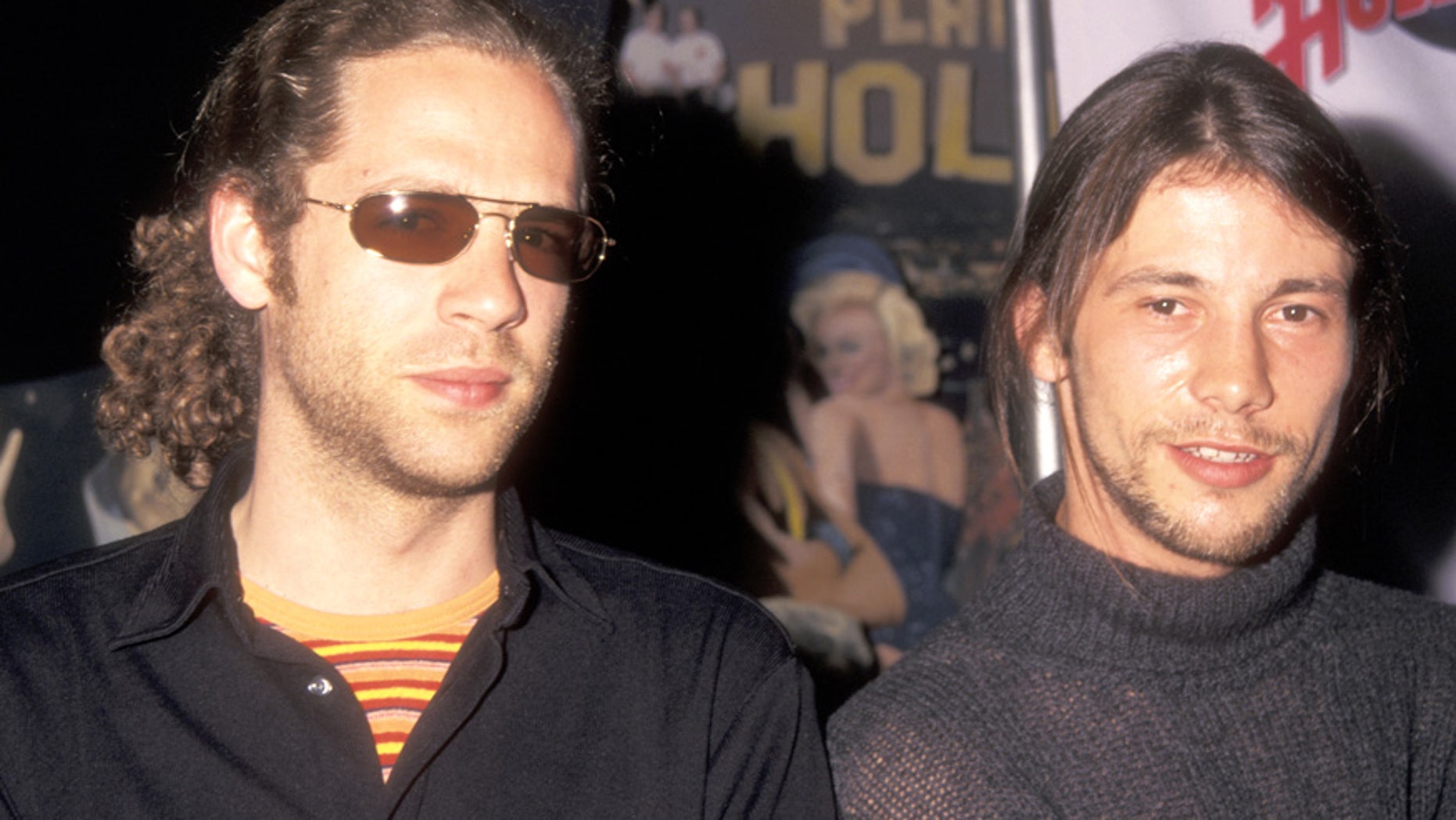 Toby Smith and Jason Kay of the funk/rock band Jamiroquai attend the press conference to announce release of the "Godzilla" soundtrack on May 18, 1998 at Planet Hollywood in New York City.