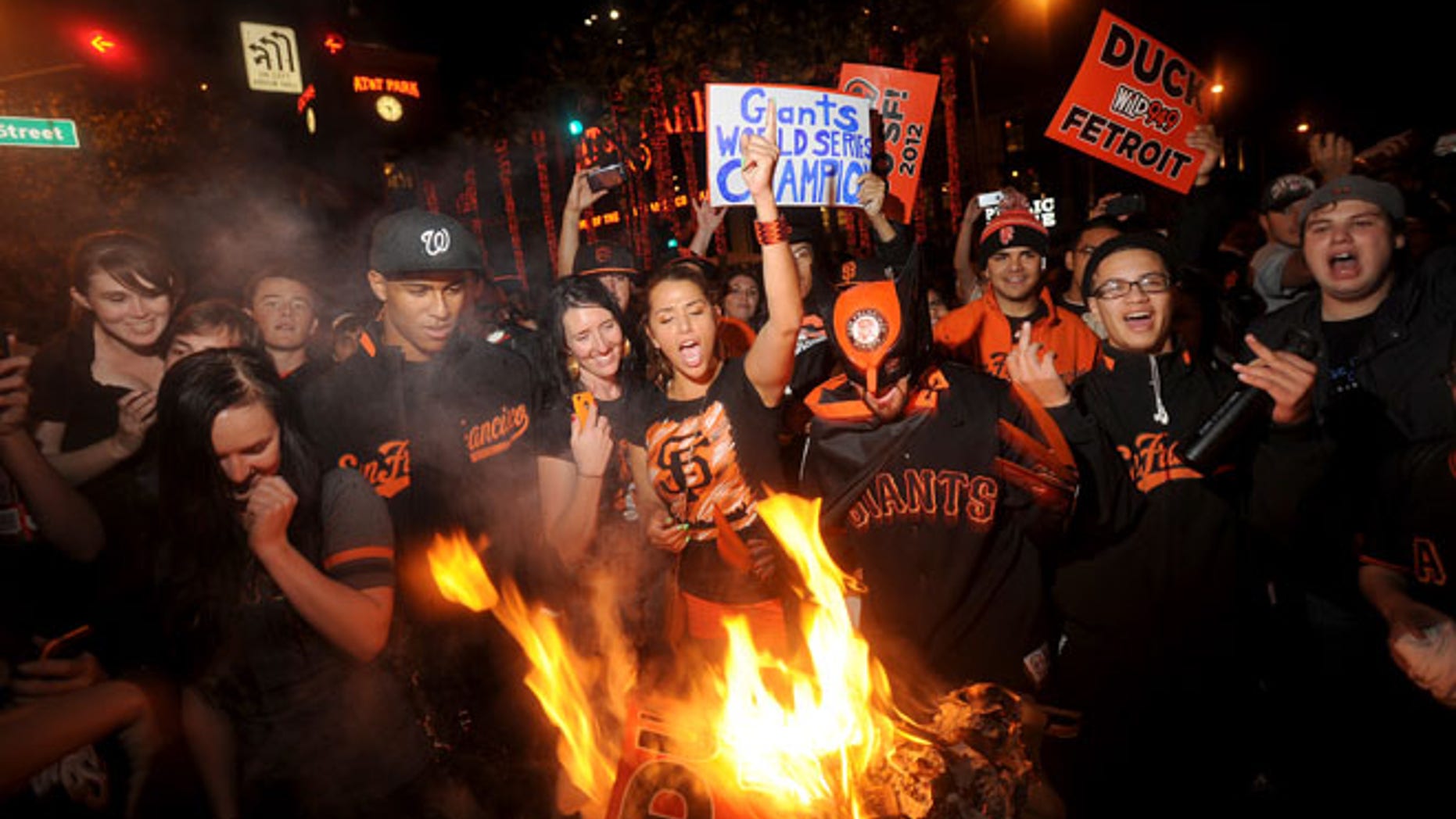 Oct. 28, 2012: San Francisco Giants fans celebrate outside PacBell Park in San Francisco after the Giants swept baseball's World Series against the Detroit Tigers.