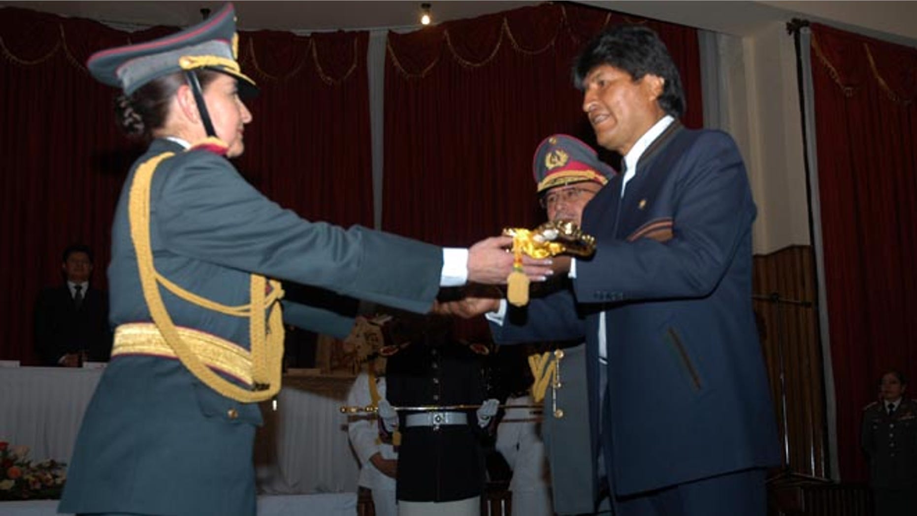 Bolivian Gen. Gina Reque Terán (L) with Bolivian President Evo Morales (R).