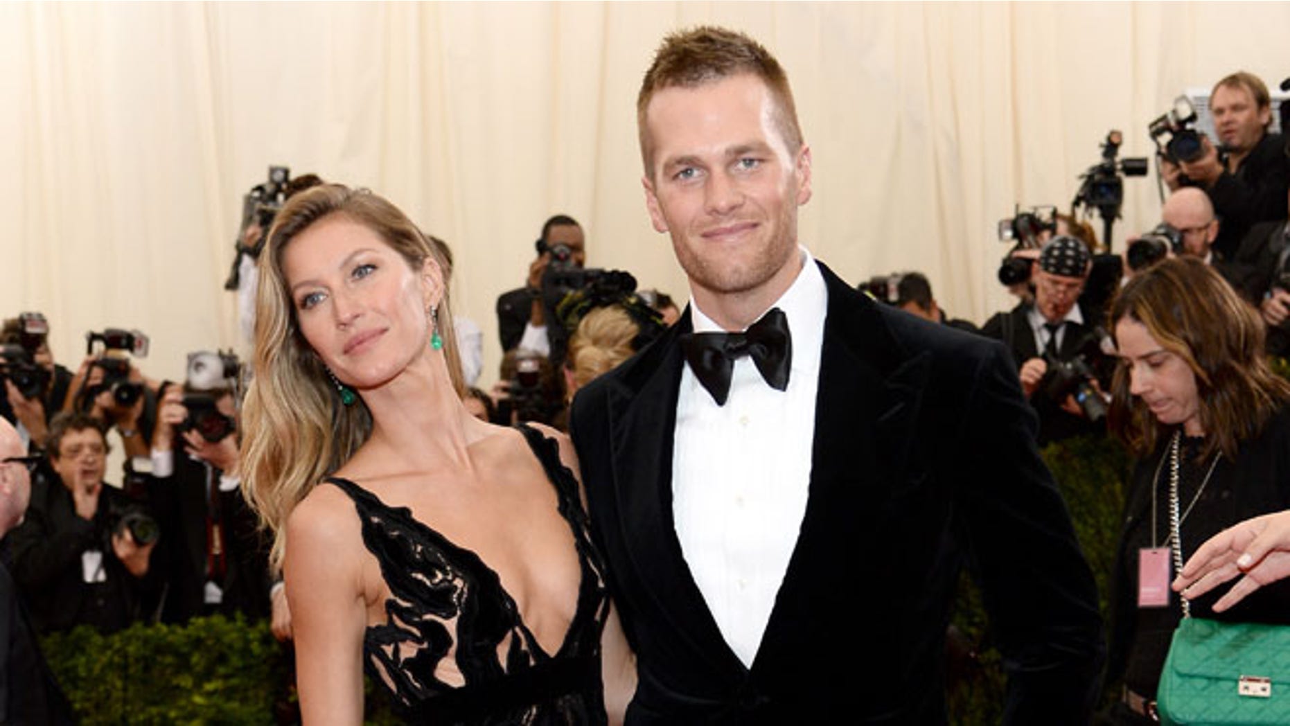 NEW YORK, NY - MAY 05: Model Gisele Bundchen (L) and NFL player Tom Brady attend the "Charles James: Beyond Fashion" Costume Institute Gala at the Metropolitan Museum of Art on May 5, 2014 in New York City. (Photo by Dimitrios Kambouris/Getty Images)