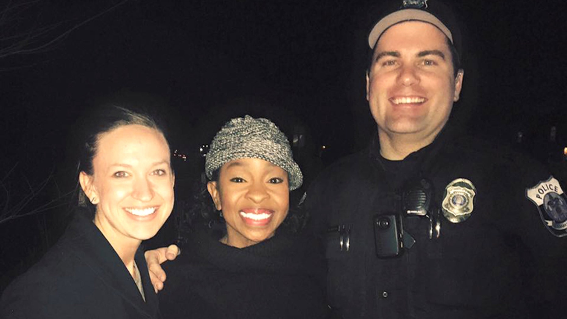 This photo provided by officer Paul Rogerson shows Rogerson, right, of the Pleasant Grove Police Department in Utah, singer Gladys Knight, center, and Rogerson's wife, left. (Courtesy of Paul Rogerson via AP)