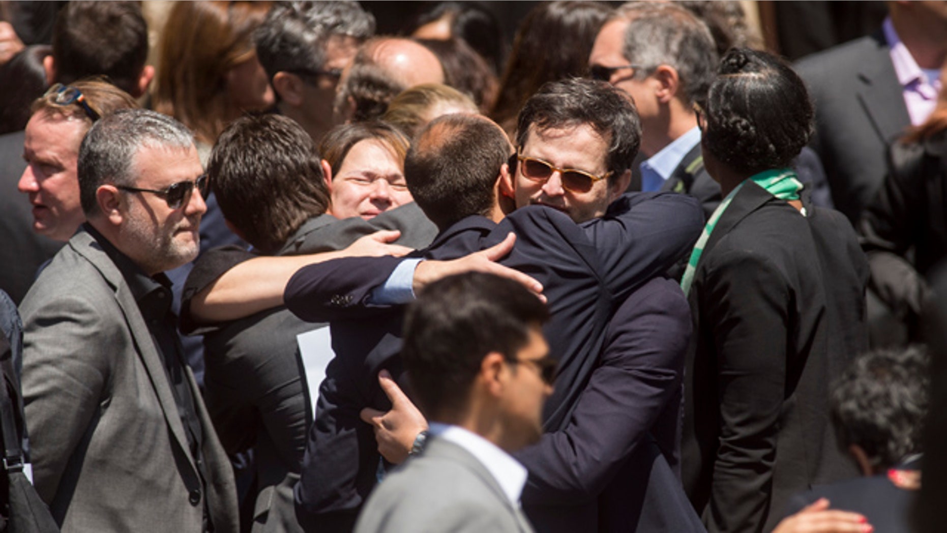 May 5, 2015: Mourners leave a memorial service for SurveyMonkey CEO David Goldberg on Tuesday, May 5, 2015, in Stanford, Calif. Goldberg, the 47-year-old husband of 'Lean In' author and Facebook executive Sheryl Sandberg, died in an accident while exercising at a Mexican vacation resort on Friday, May 1. Authorities say he apparently slipped on a treadmill and struck his head. (AP Photo/Noah Berger)