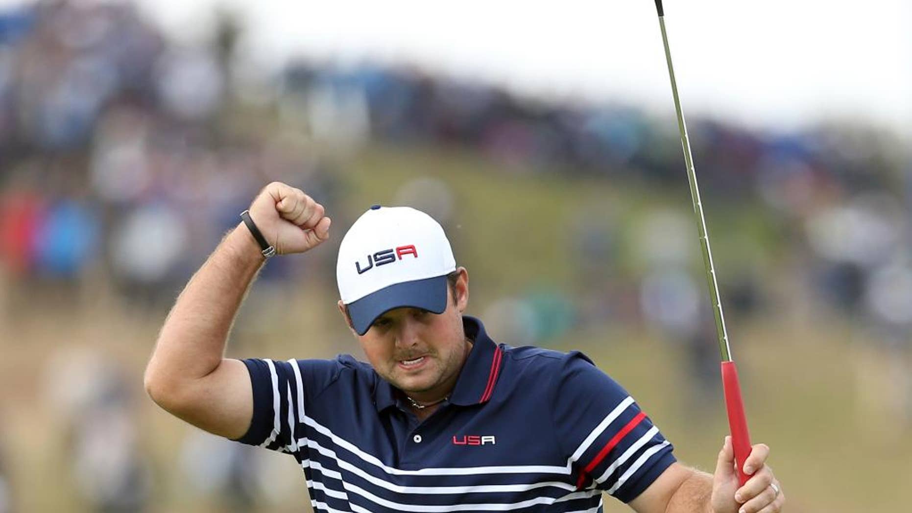 FILE - In this Sunday, Sept. 28, 2014 file photo, Patrick Reed of the US celebrates his birdie and winning the 8th hole during the singles match on the final day of the Ryder Cup golf tournament, at Gleneagles, Scotland. Patrick Reed hasn't received this much attention since he pressed his finger to his lips in Scotland to quiet the Ryder Cup crowd. This time it was his own mouth that got the 24-year-old American into trouble when he berated himself with swearing and a gay slur. Reed apologized on Friday, Nov. 7, 2014 for his outburst at the HSBC Champions, which was captured on live television during the opening round of a World Golf Championship. (AP Photo/Peter Morrison, File)