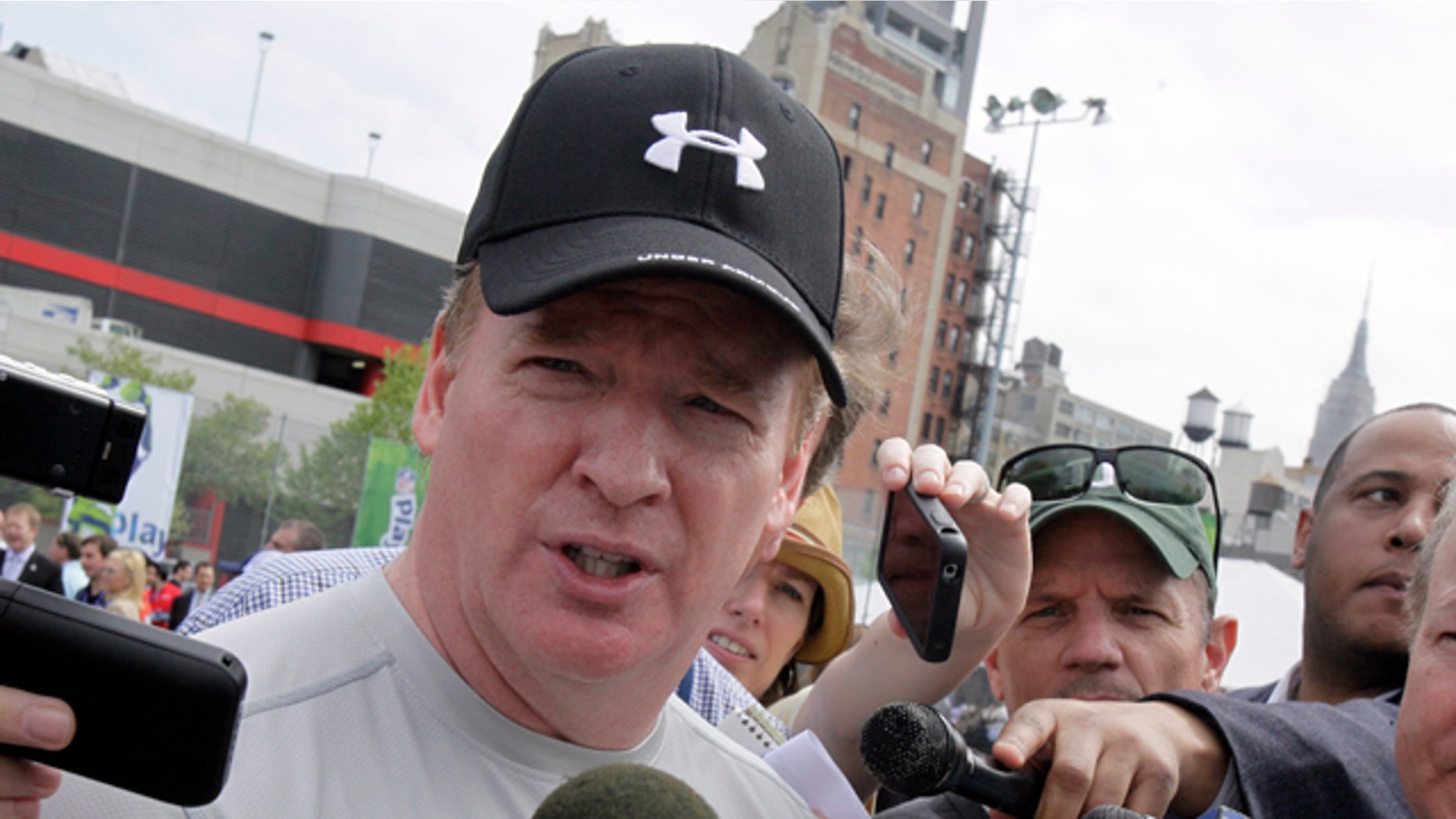 April 27: National Football League commissioner Roger Goodell is surrounded by media at an NFL predraft event in New York.